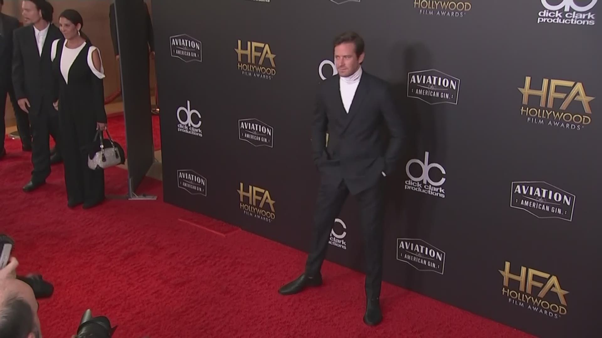 Various scenes of actor Armie Hammer on the red carpet, including actress Felicity Jones and ex-wife Elizabeth Chambers.