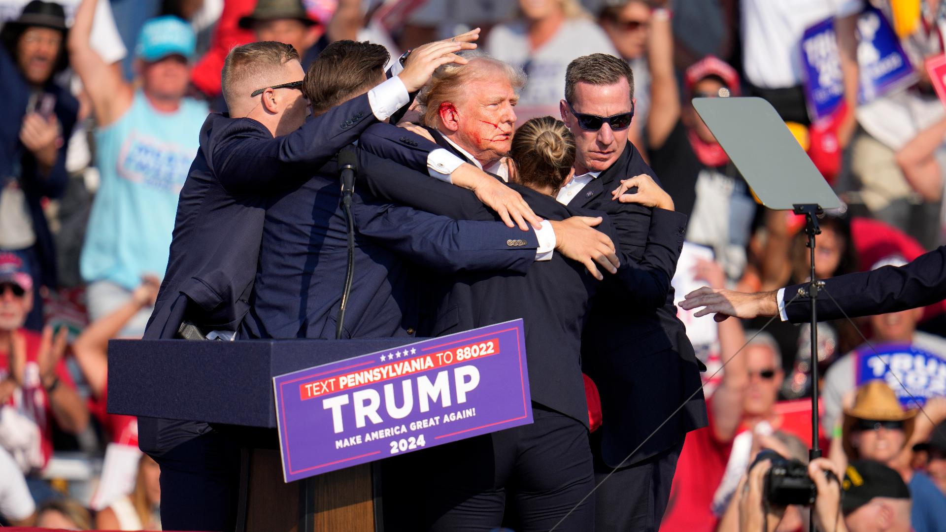 RAW VIDEO: Donald Trump rushed off stage at rally after what sounded ...