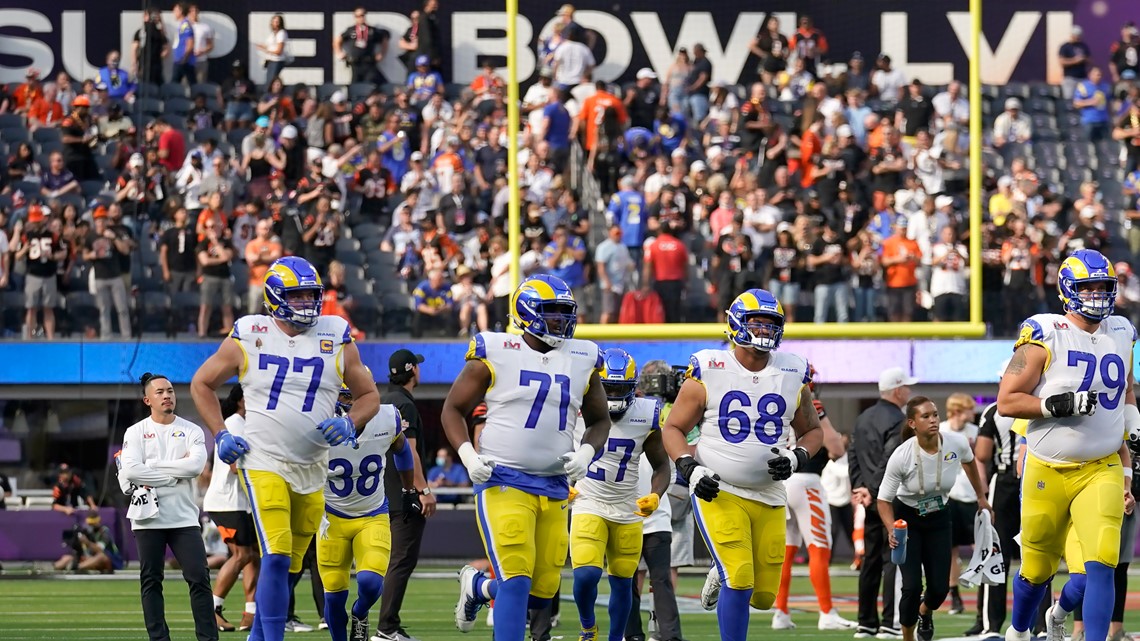 Cincinnati Bengals guard Hakeem Adeniji (77) reacts after