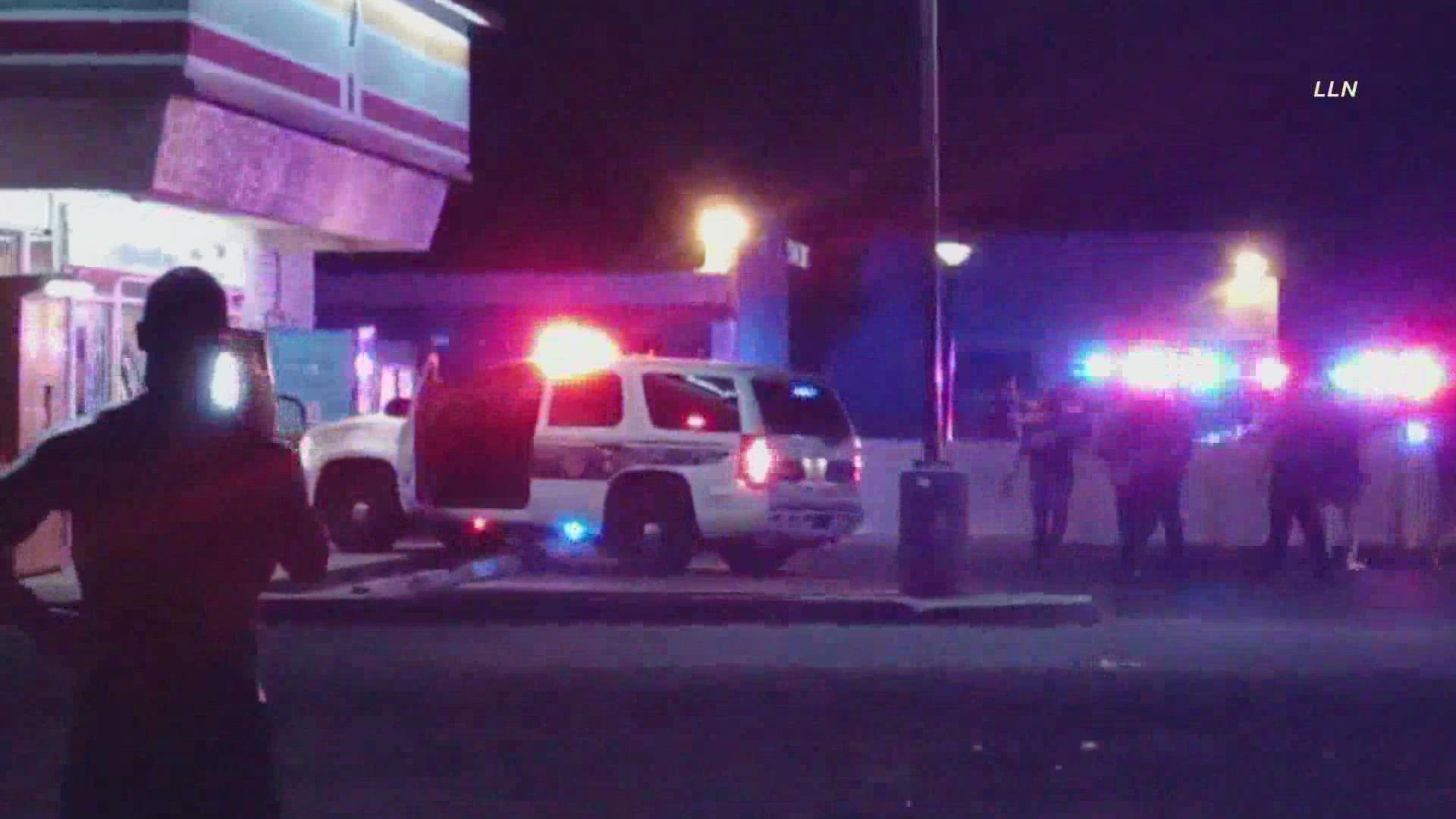 A man with a weapon walked into the convenience store when officers shot at him, the Phoenix Police Department said.