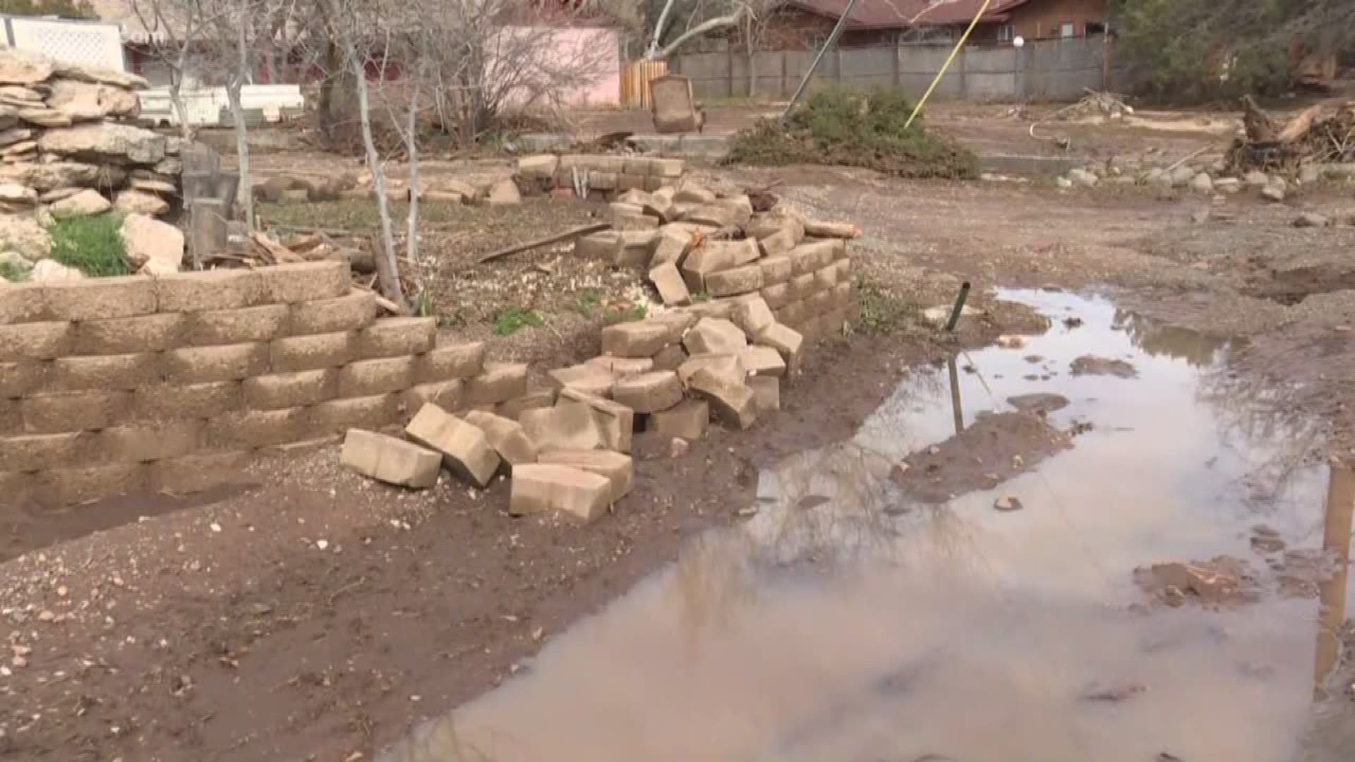 Flood waters from Beaver Creek rushed towards homes in Rimrock, forcing many to evacuate their homes. Families can't stay in their homes for now because of possible bacteria from the water and electrical issues.