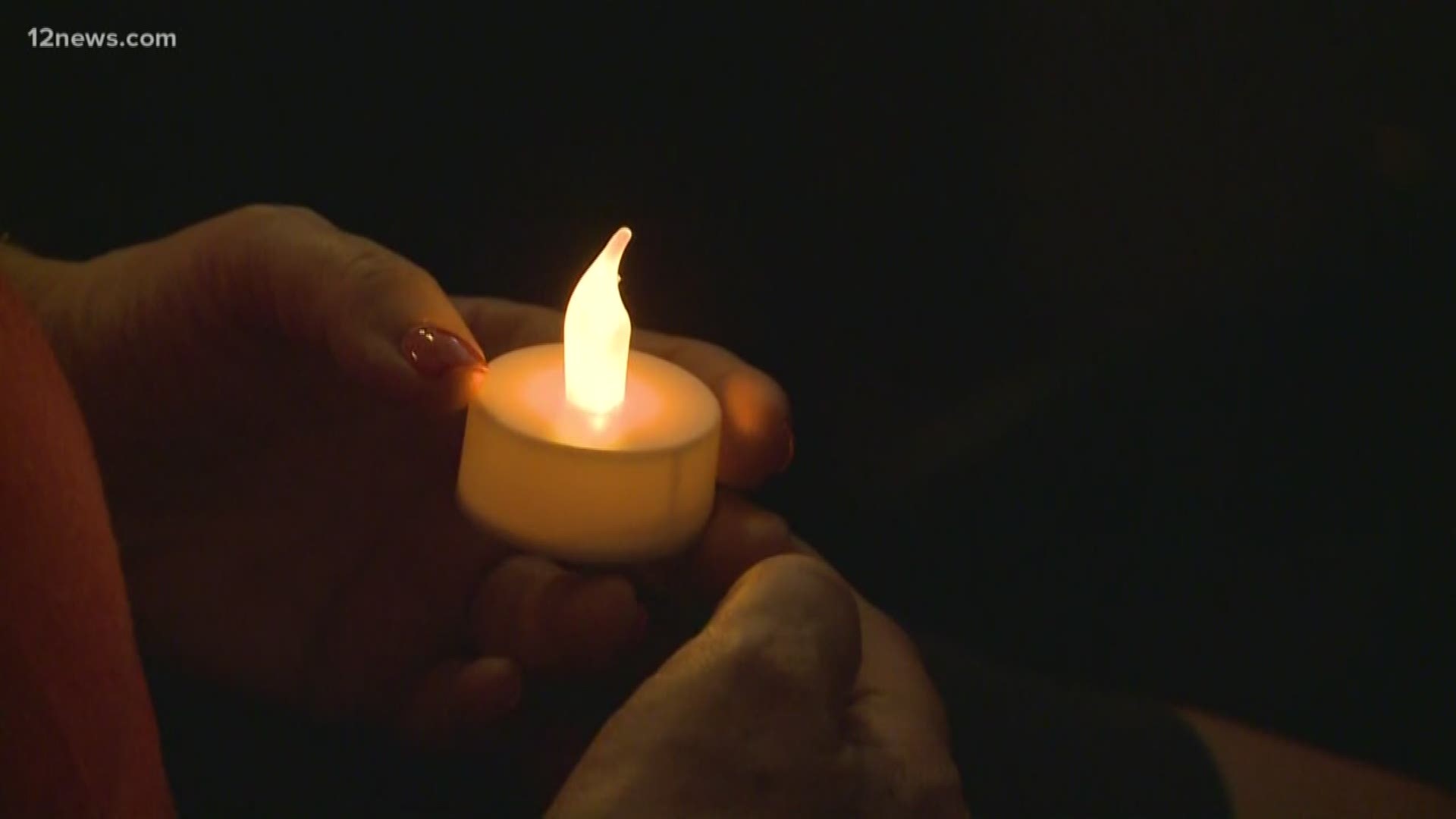 First Church United Church of Christ of Phoenix held a candlelight vigil Sunday after 29 people were killed in 2 mass shootings in less than 24 hours.