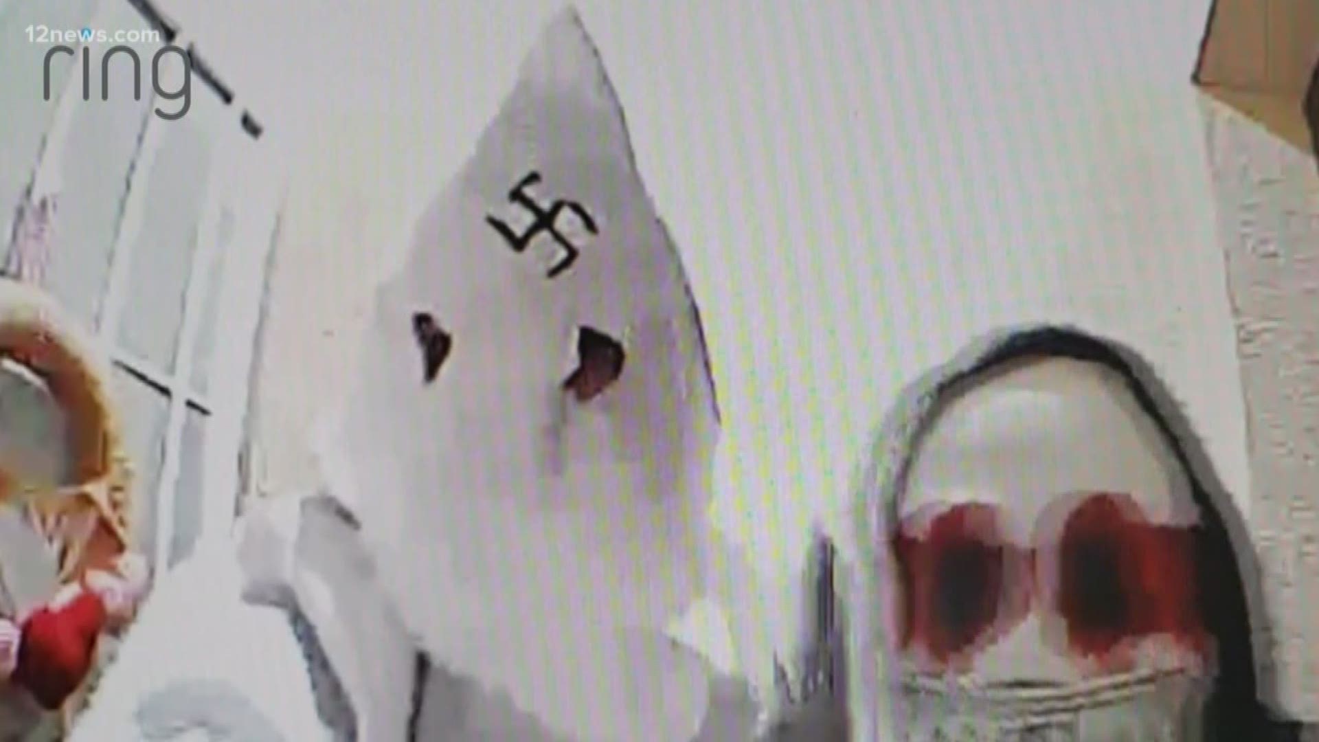 A doorbell camera at an Anthem home caught two threatening visitors, one was wearing a KKK costume. Phoenix Police is investigating it as a hate crime. If you have any questions call Phoenix PD.