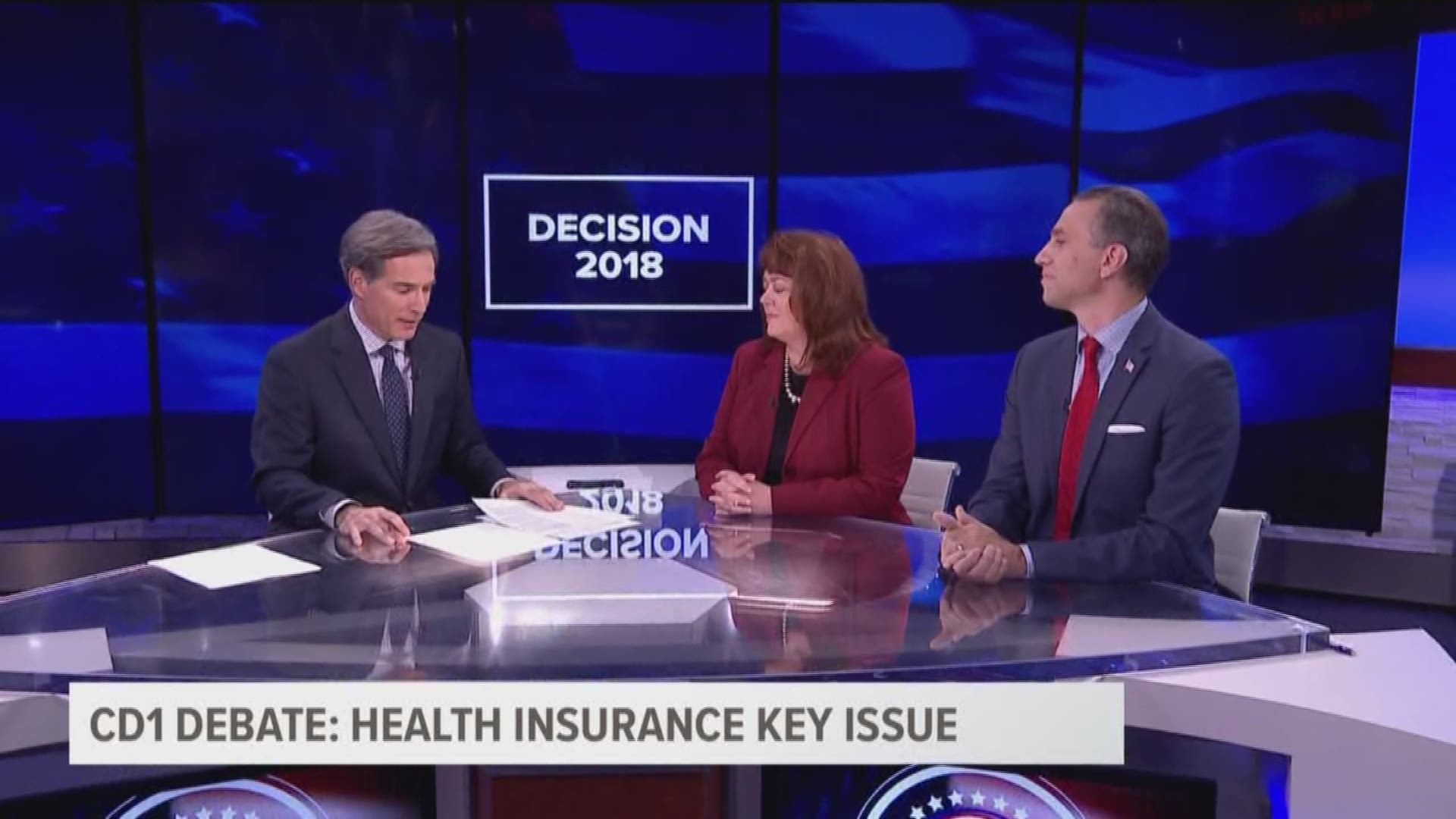Republican candidates discuss whether they would cut back health insurance programs in district with large number of uninsured.
