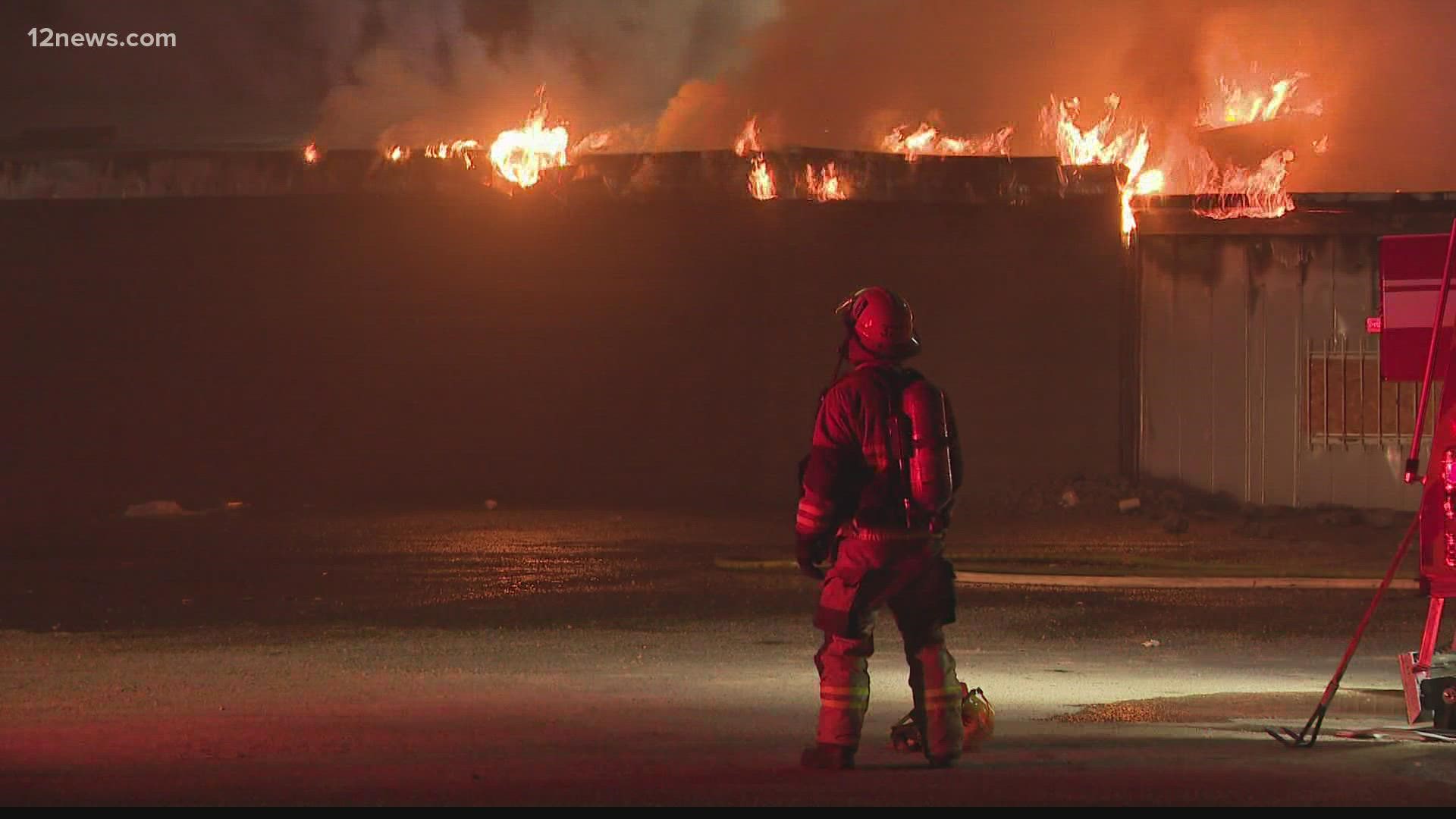 Fire crews had their hands full battling a massive fire at an empty building near 7th Avenue and Camelback Road Monday night.