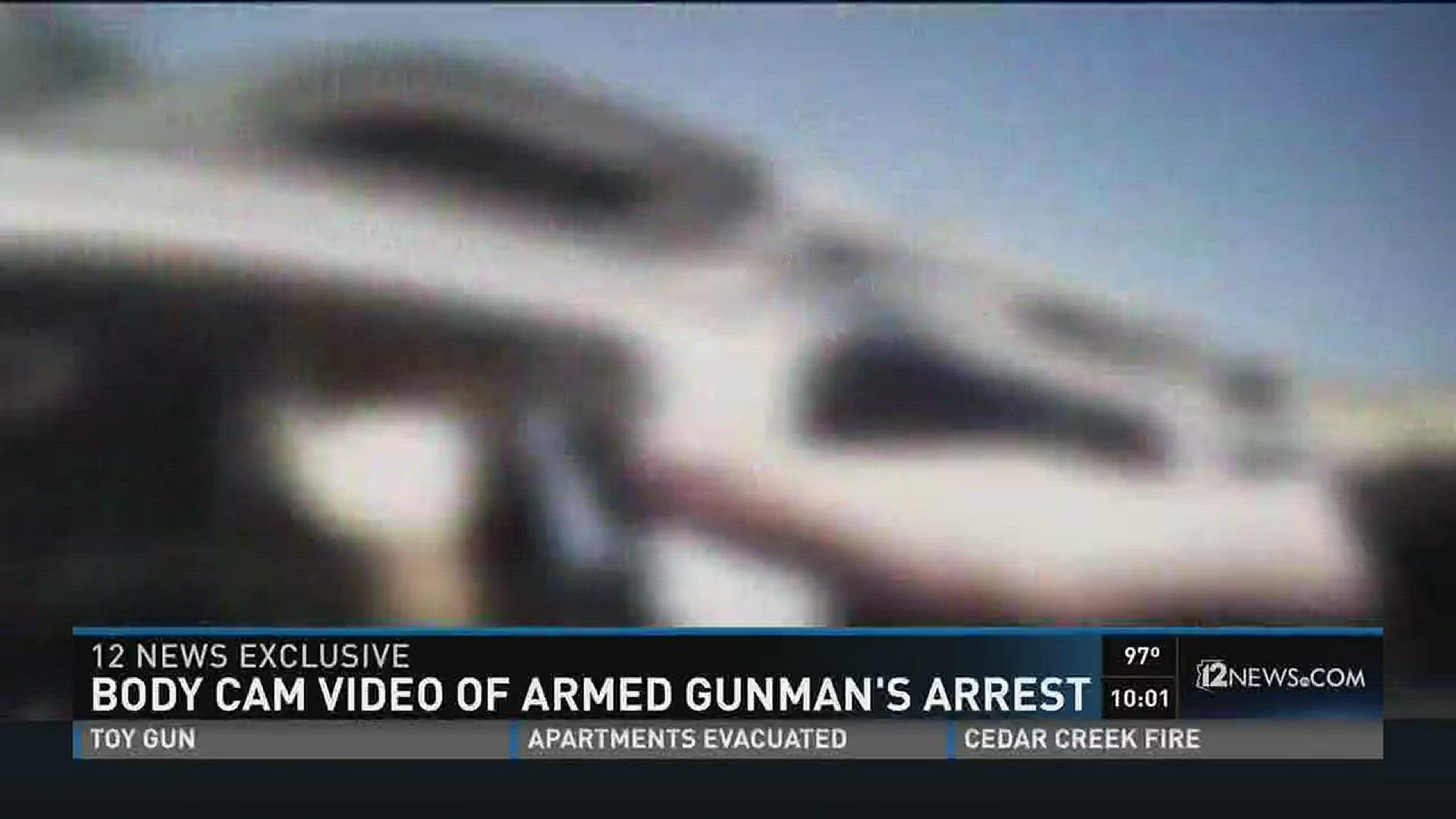 Body cam video of armed gunman's arrest.