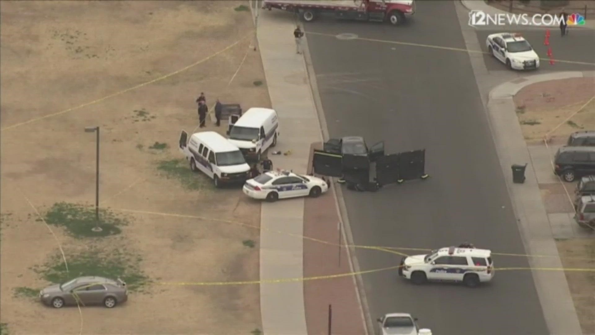 Two men were found dead inside a parked vehicle near 83rd Ave. and Thomas Road, according to Phoenix police.