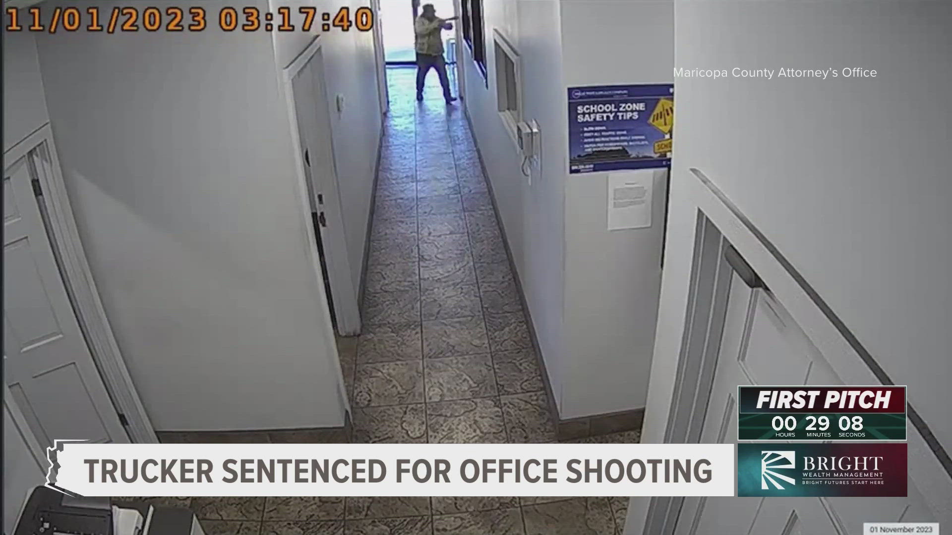 Surveillance footage released by investigators shows the defendant walking into the Phoenix office armed with a firearm. 