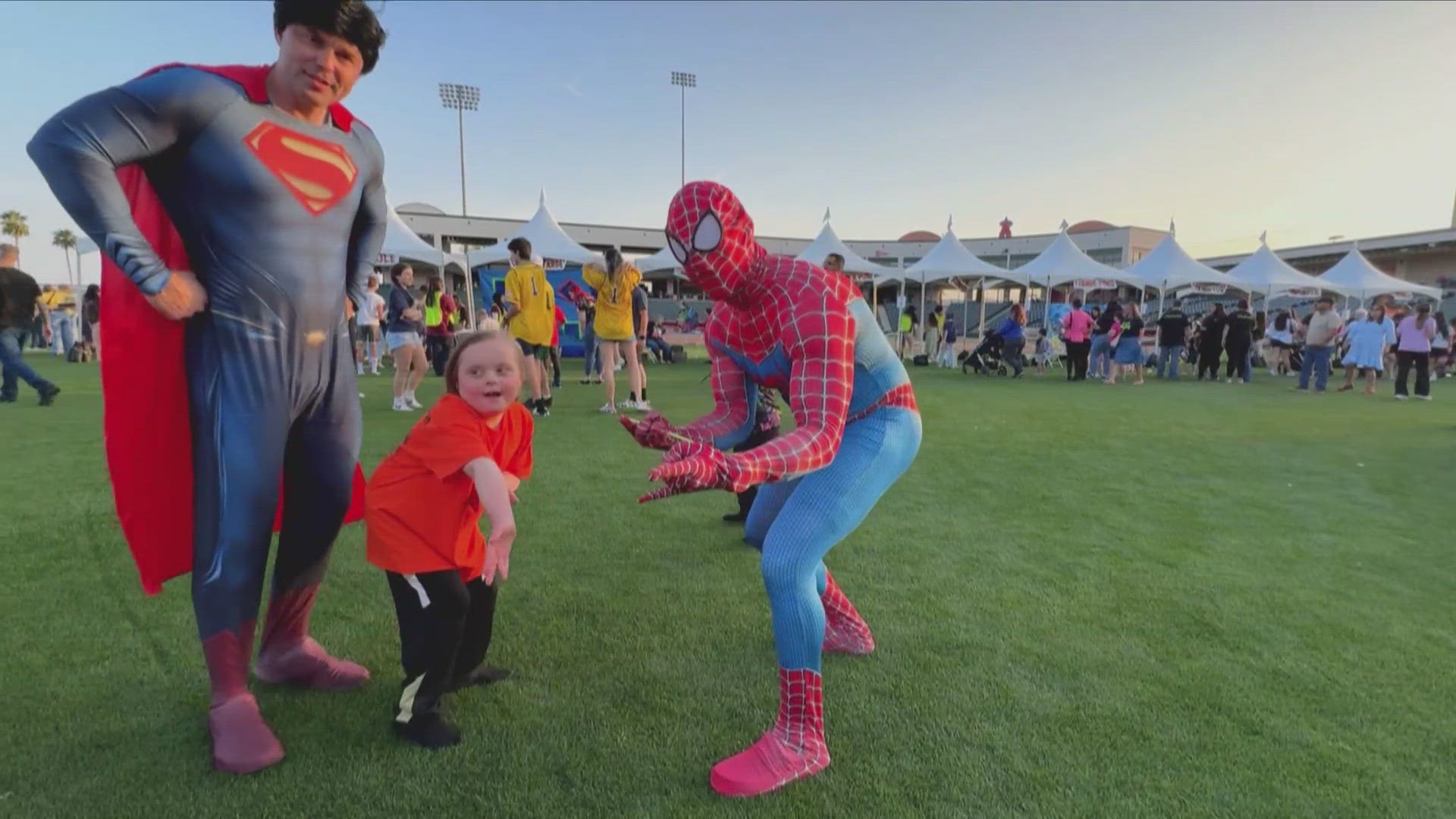 Many people gathered at Tempe Diablo Stadium on Saturday for a glow walk featuring the world's largest walk-through LED tunnel. 
