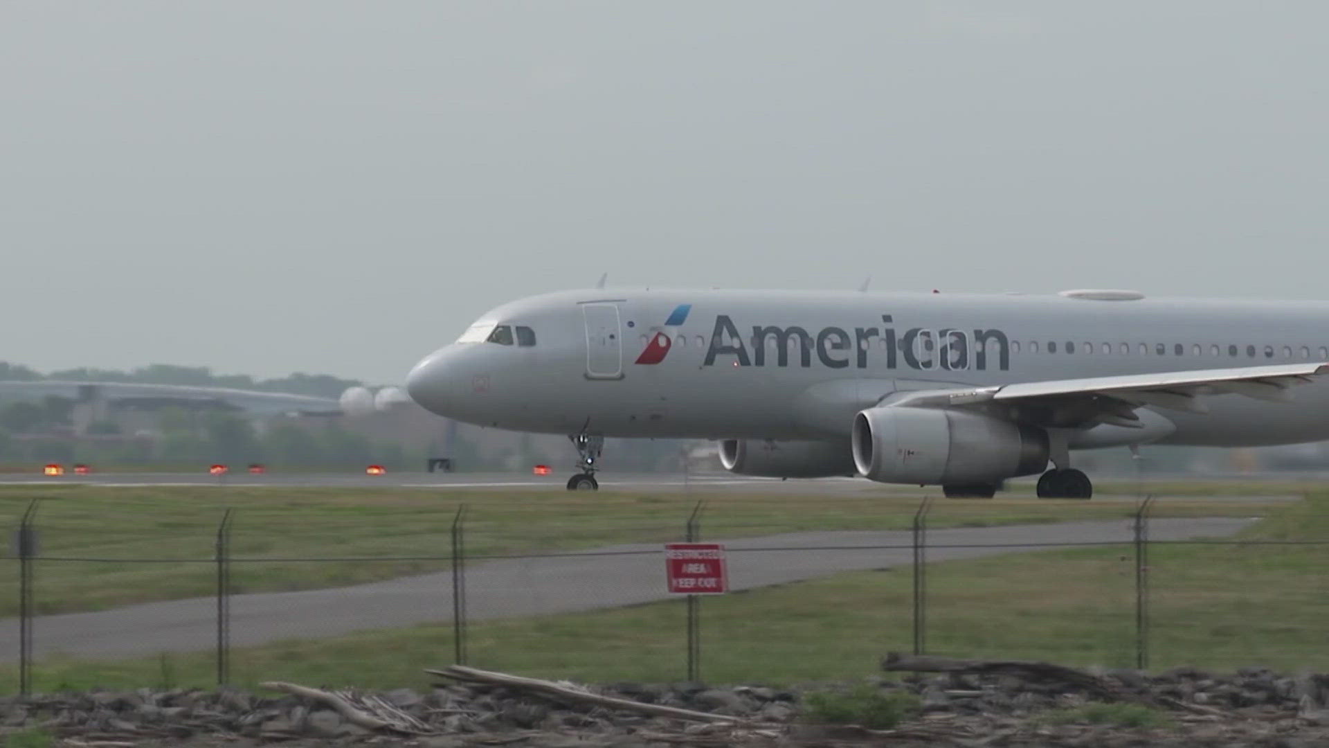 Black passengers who were briefly ordered off an American Airlines plane in January sued the airline, alleging that they were victims of racial discrimination.