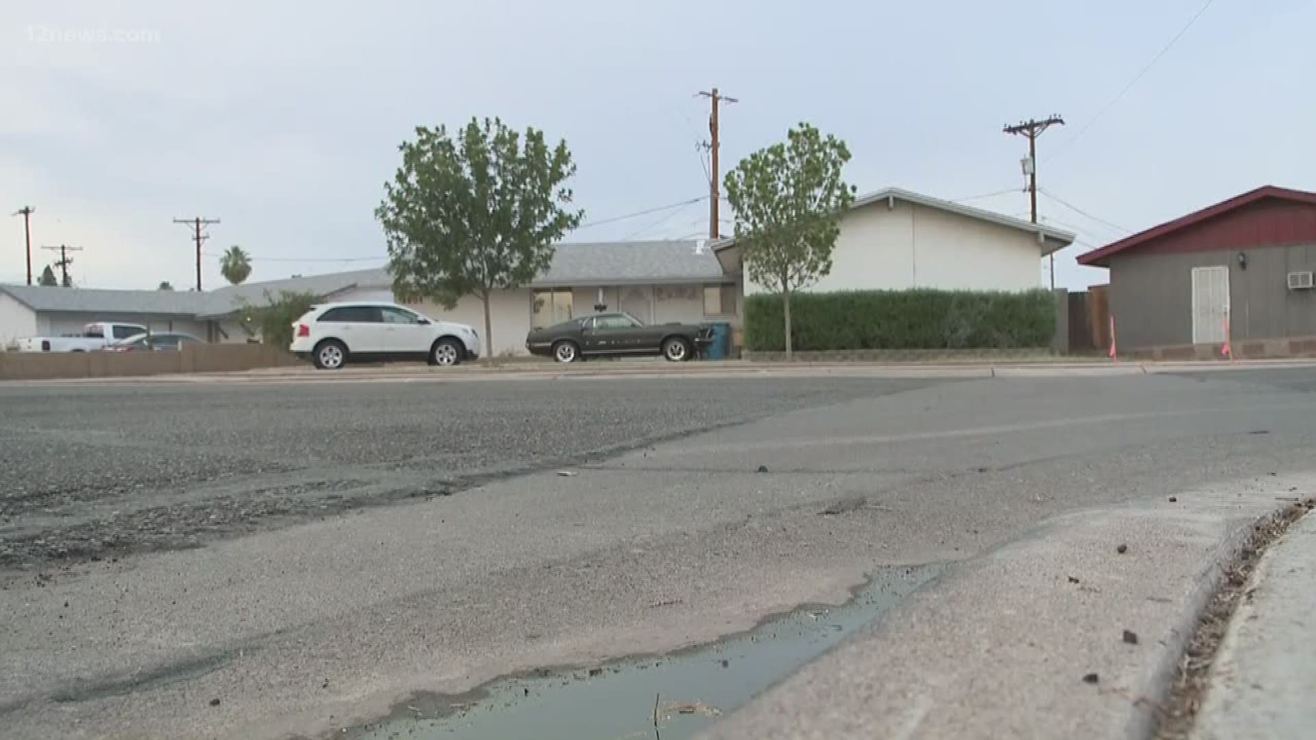 Police say the man was pointing a gun at neighbors near Diana and 35th avenues in Phoenix around 7:00 a.m.