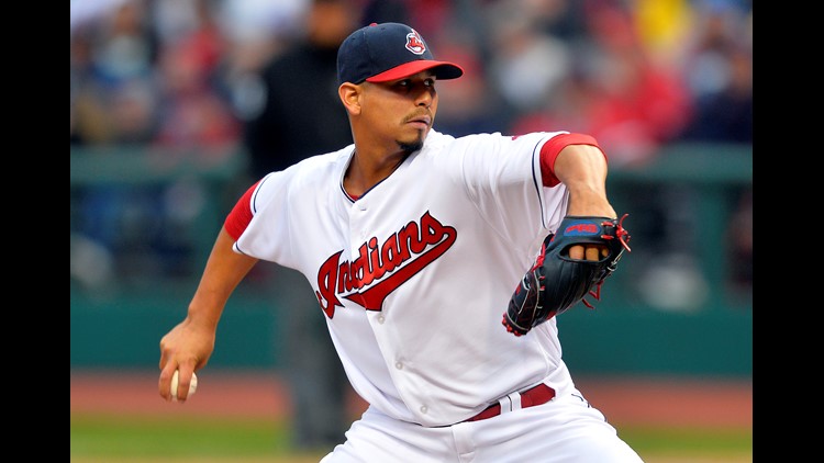 Cleveland Indians pitcher Carlos Carrasco throws live batting