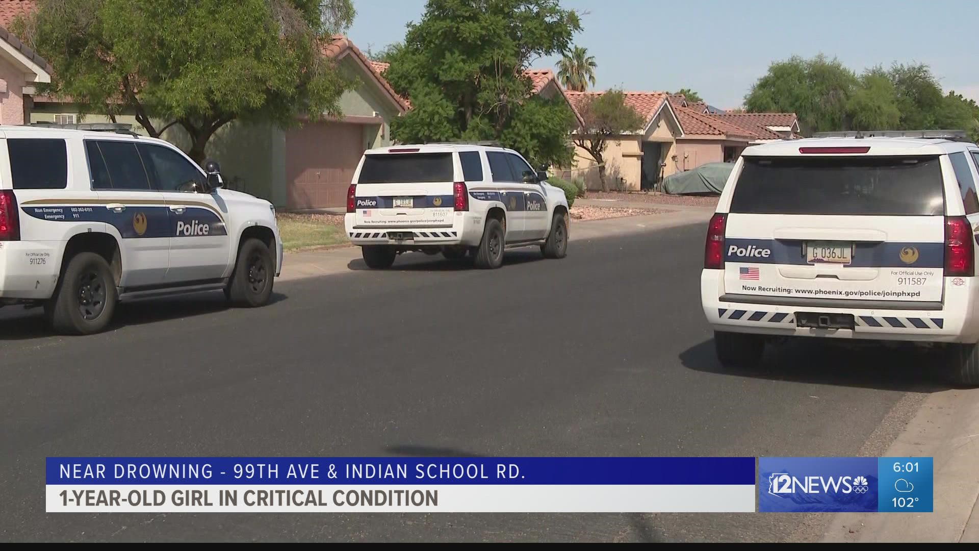 A 1-year-old girl is in extremely critical condition after a near-drowning at a West Phoenix home on Saturday afternoon.