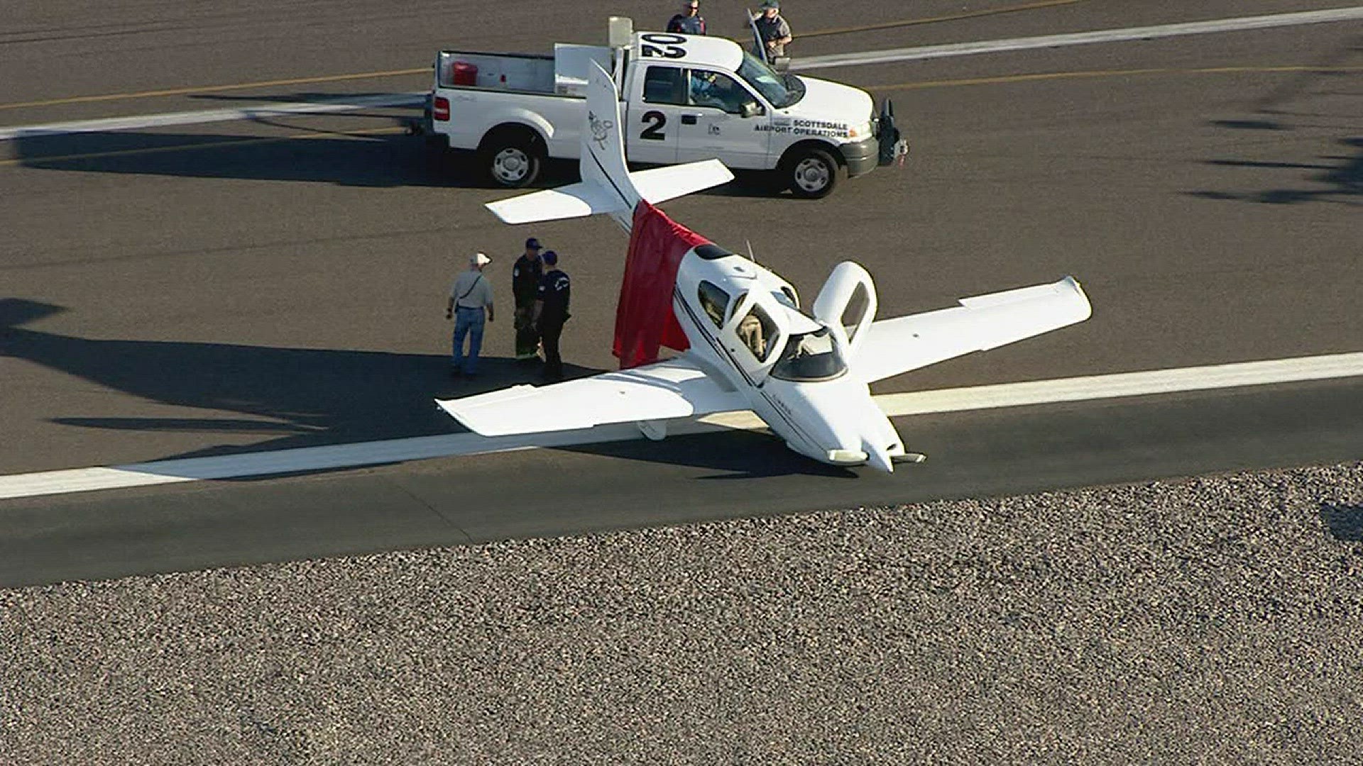 A landing gear malfunction caused a plane to skid off the runway at Scottsdale Airport.