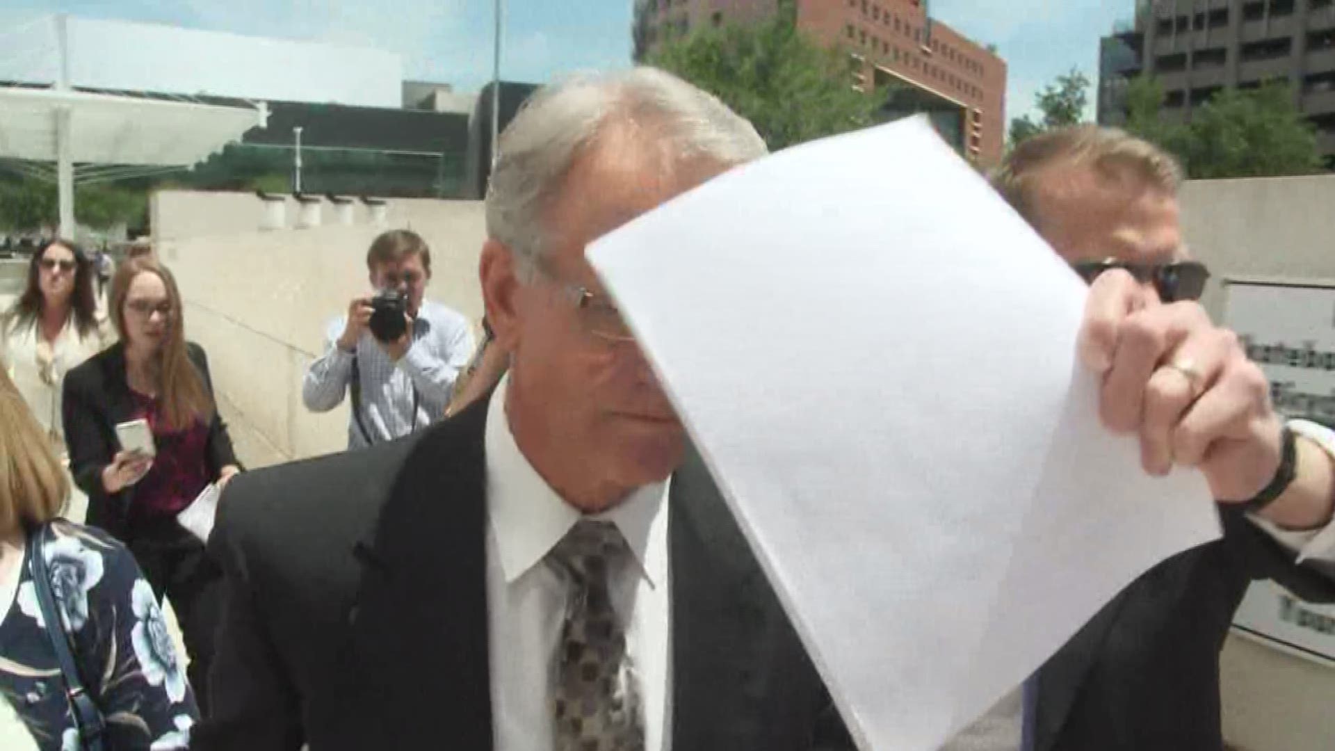 George Johnson is charged with bribing former Arizona Corporation Commissioner Gary Pierce in exchange for sticking Johnson's customers with his income-tax bill.