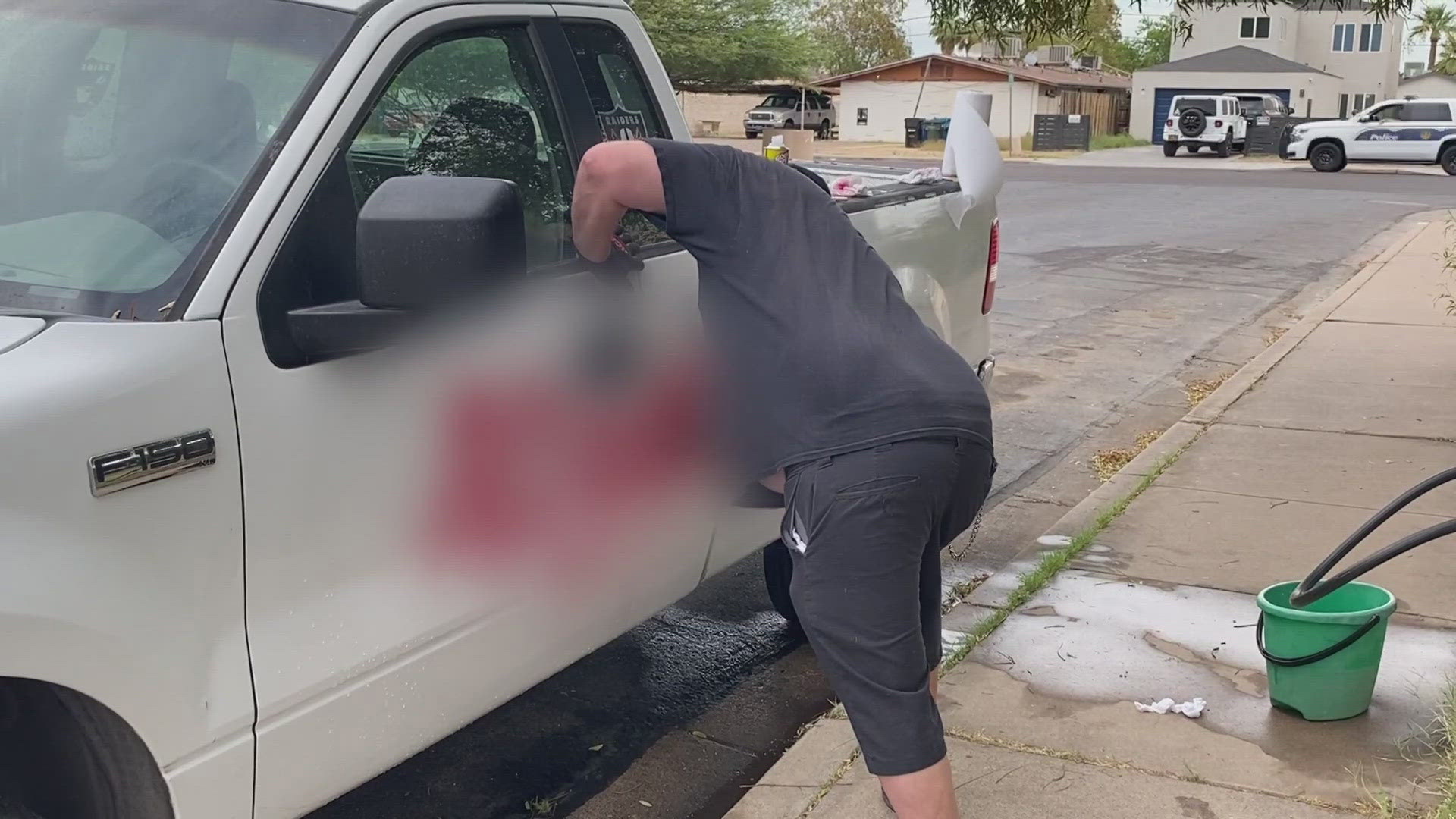 Neighbors in a neighborhood near 24th Street and McDowell in Phoenix react after their cars were spray-painted with racial slurs for the 2nd time in a week.