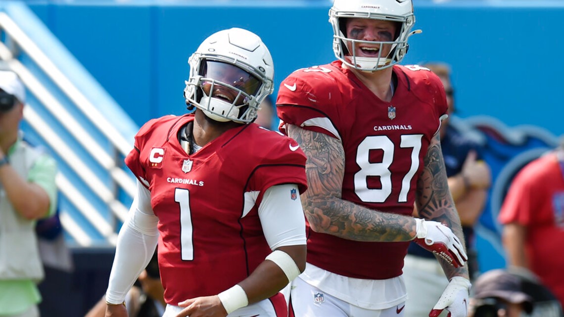 Arizona Cardinals defensive end J.J. Watt (99) celebrates after teammate  Corey Peters, third from left, recovered a Tennessee Titans fumble in the  first half of an NFL football game Sunday, Sept. 12