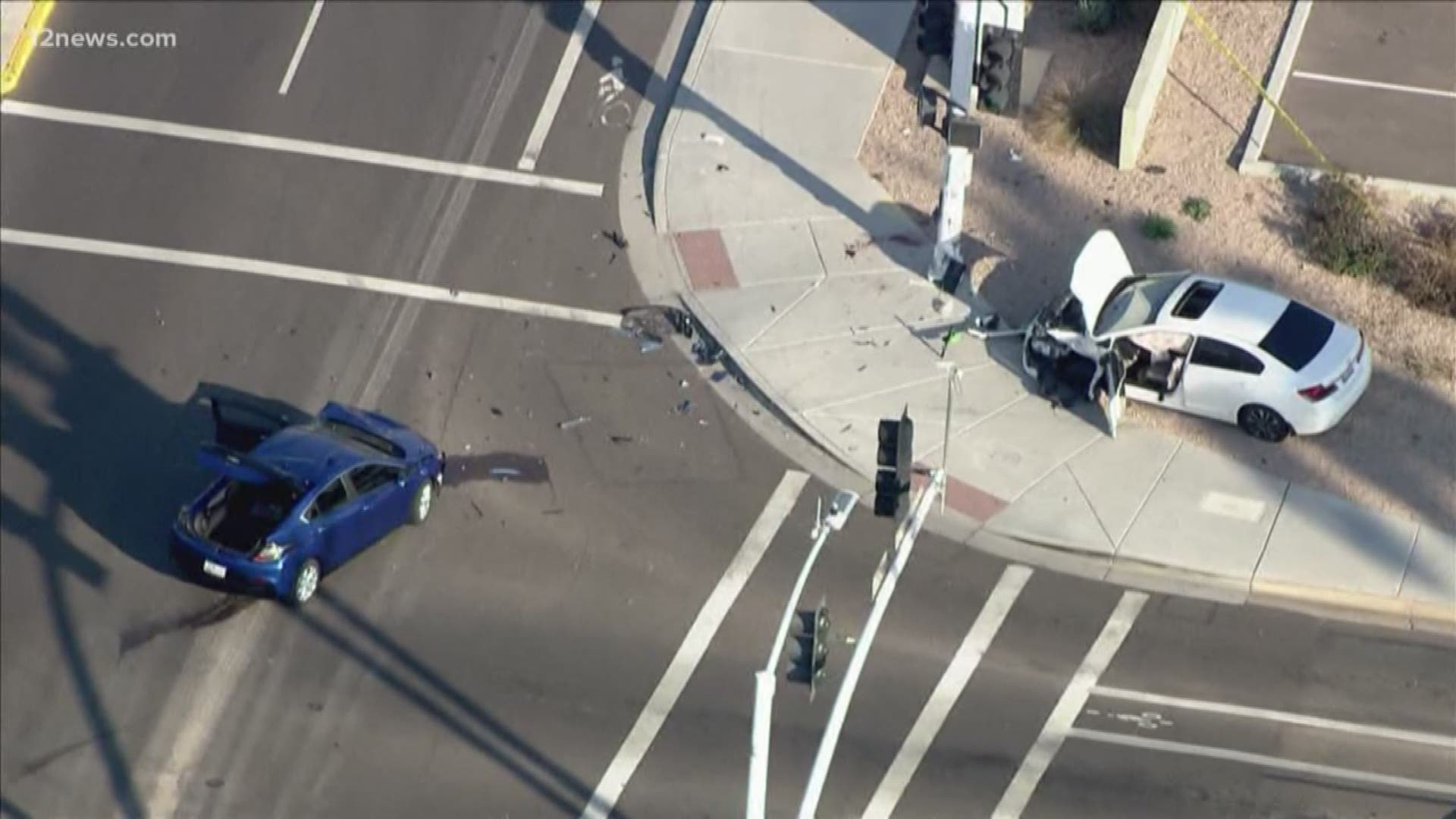 The pedestrian was struck by one of the vehicles after the two cars collided at Miller and Thomas roads.