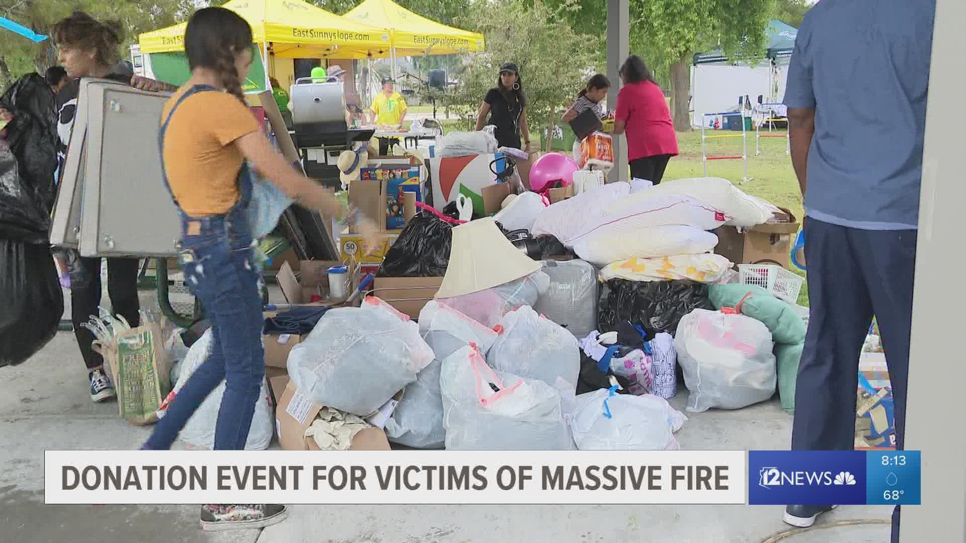 One week after a large apartment fire left almost 100 people with just the clothes on their backs, neighbors in Sunnyslope collected donations for the families.