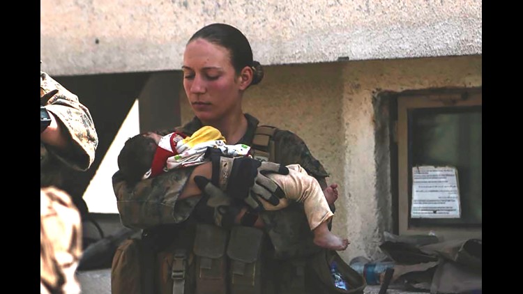 Slain Marine who cradled baby at Kabul airport 'loved her job'