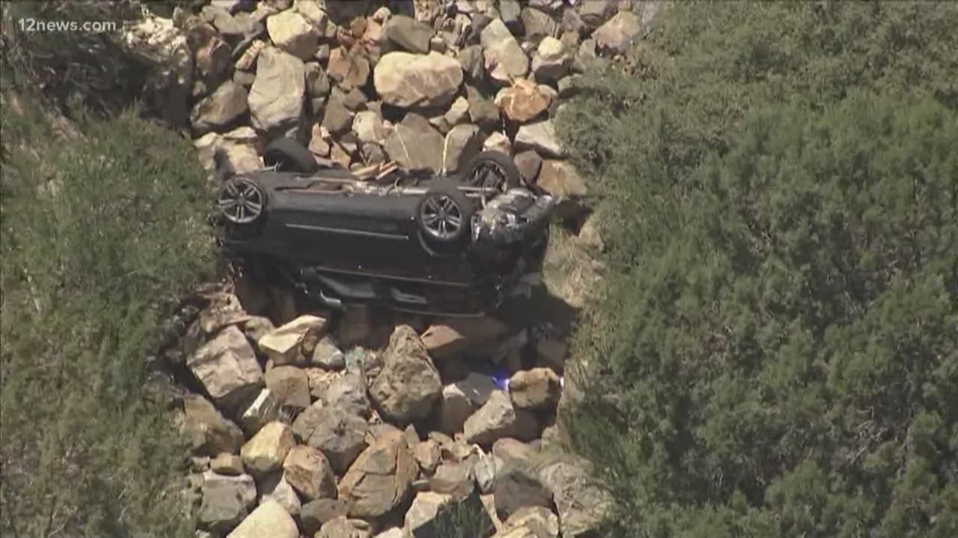 A car chase in Prescott Valley sent a suspect's SUV flying 500 feet off of a cliff. DPS troopers were pursuing the suspect because the car he was in was reported as stolen. The suspect bailed out of the car before it went over the cliff and was found in some trees.
