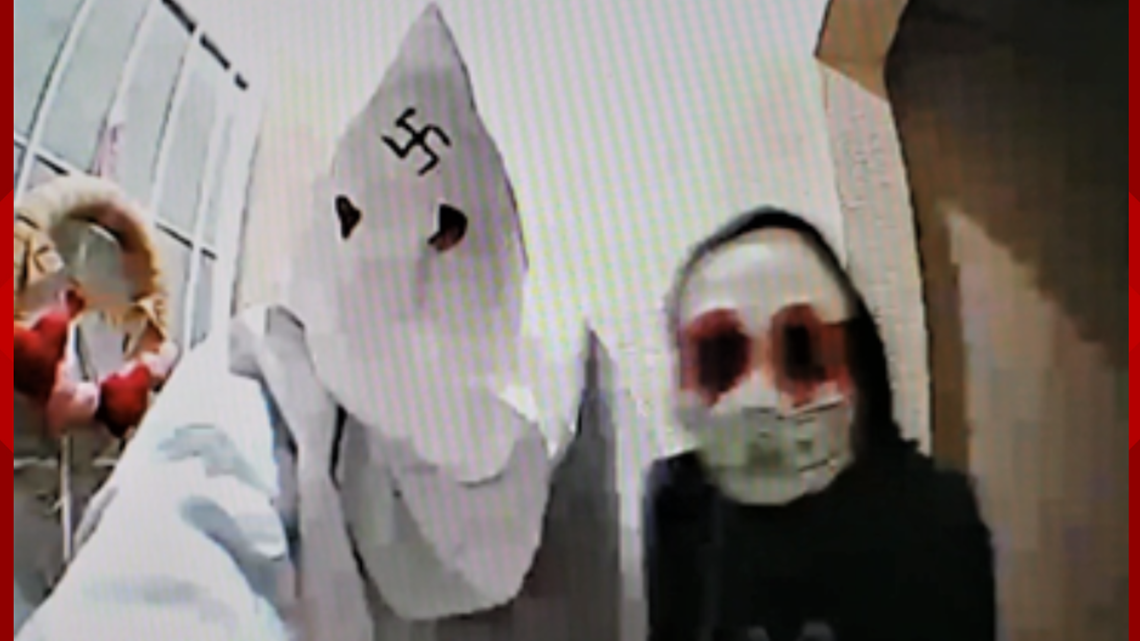 Caught on door cam: Klansman with swastika on hood | 12news.com