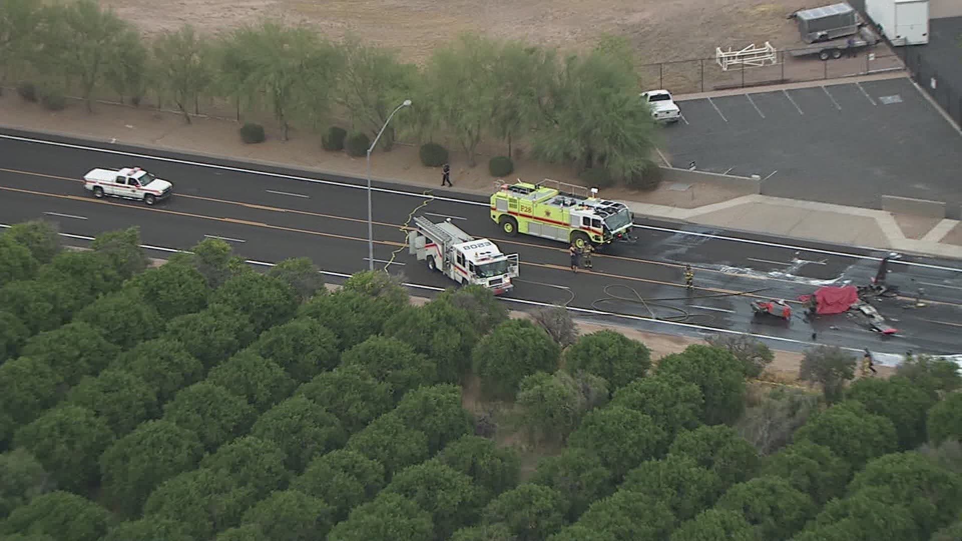 Sky 12 over crews working plane wreck in Mesa, AZ