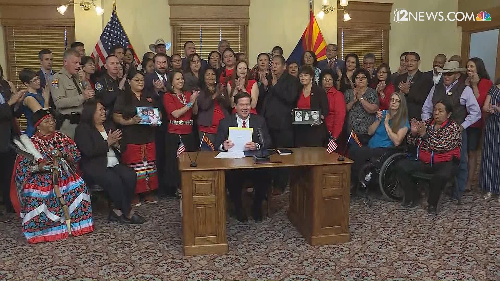 Arizona's Governor Doug Ducey signed a bill Tuesday that will take action for missing and murdered Indigenous women and girls in the state. The bill establishes a 21 member study committee. The governor said the goal of the bill is to, "determine how Arizona can reduce and end violence against Indigenous women and girls." The bill passed unanimously in the Arizona legislature.