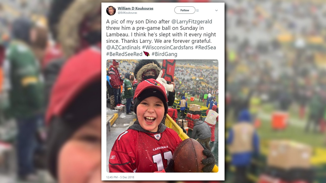LARRY FITZGERALD AND SON TAKE IN A GAME