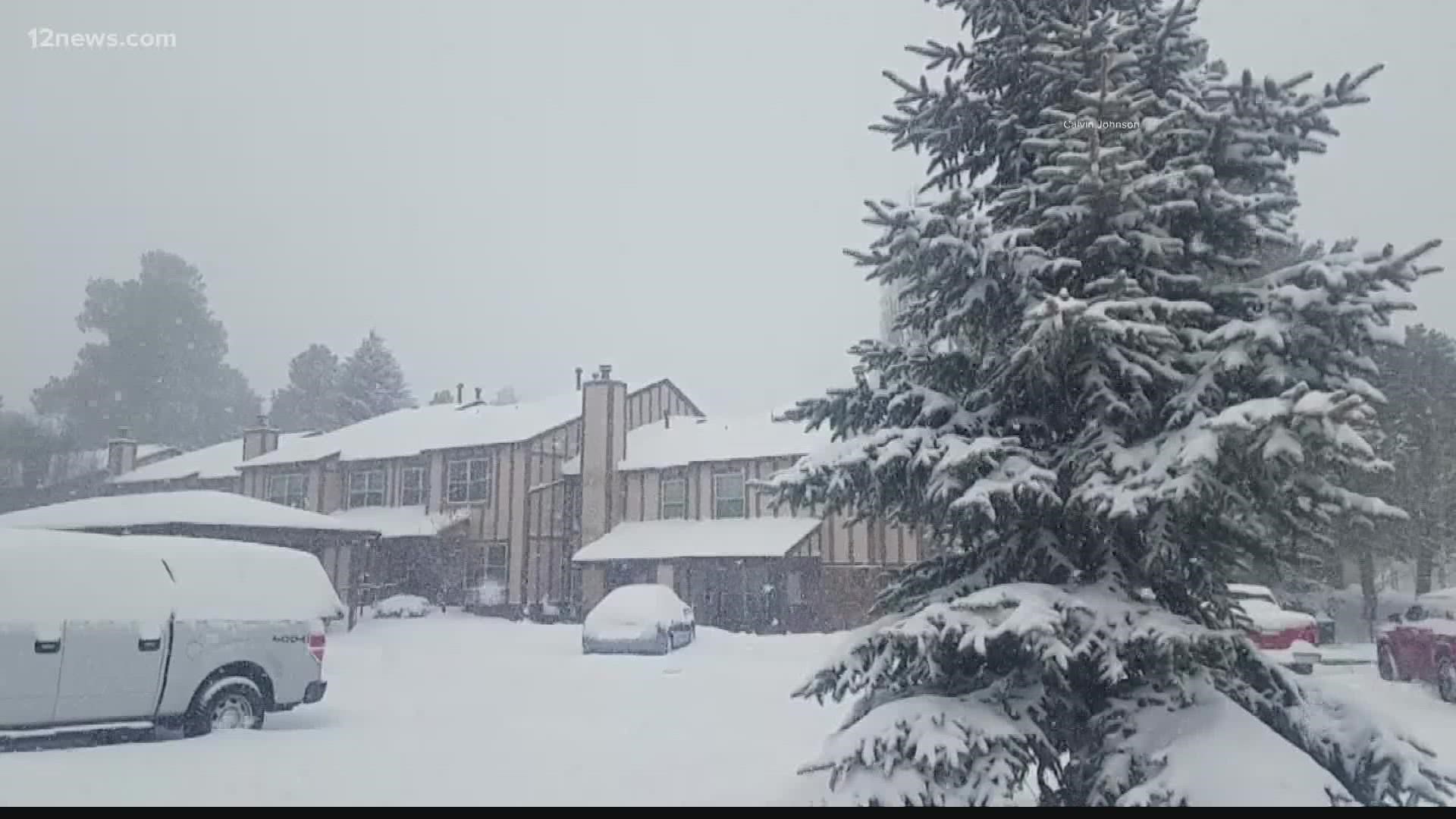 A major cold front across the US made its way to Arizona and dropped a big layer of snow on Flagstaff on Wednesday.