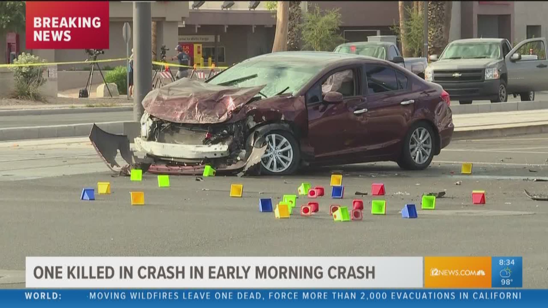 Police are investigating after they say an SUV ran a red light, colliding with another vehicle, then rolling onto the light rail track. The woman driving the SUV was pronounced dead at the hospital.