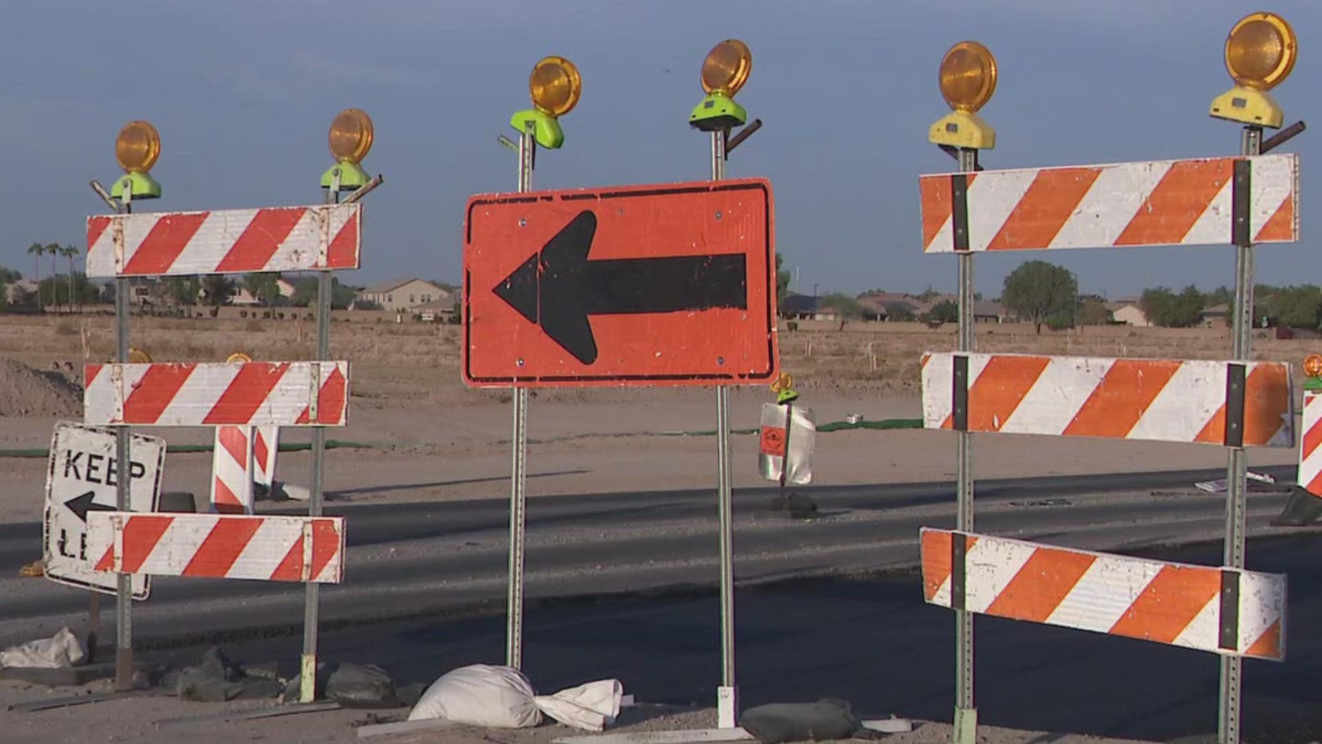 The video appears to show the sign warning drivers to merge was knocked over.