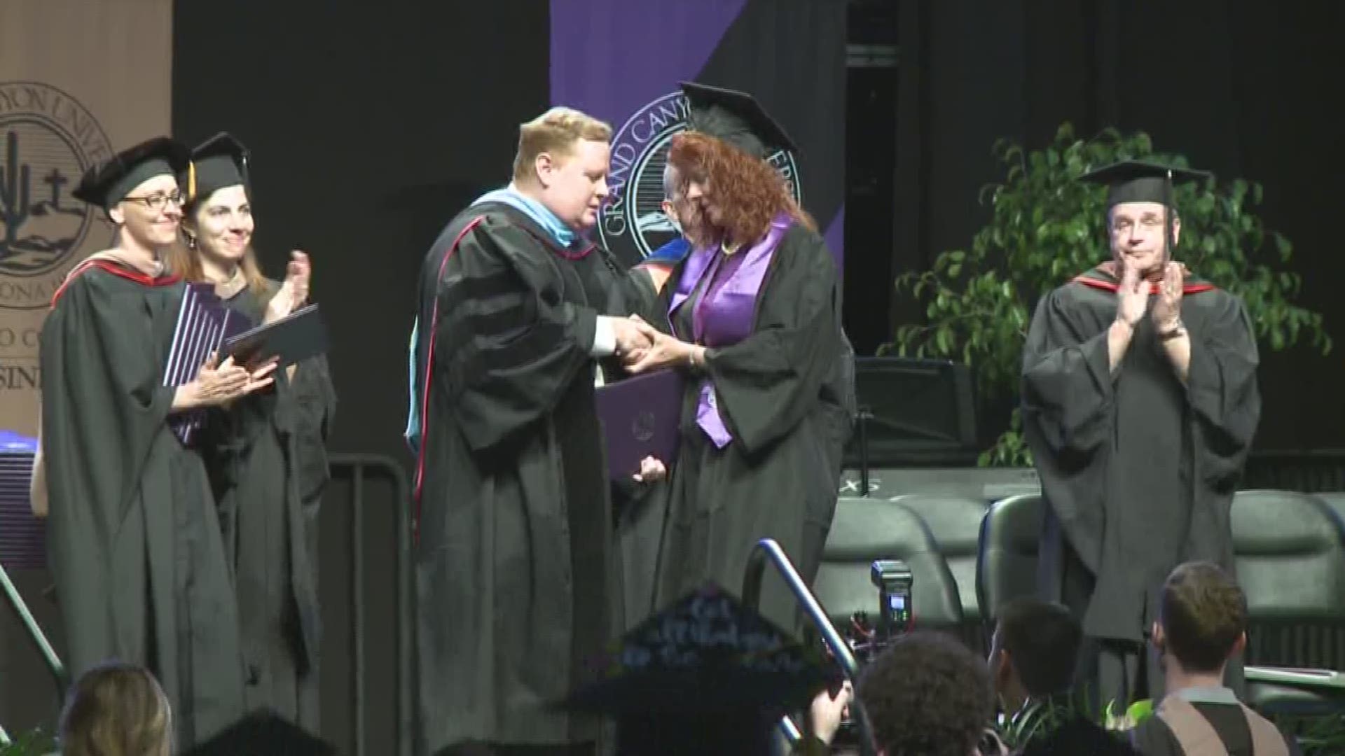 Cathy Hocking accept GCU diploma on behave of her late daughter, Karli Richardson who was killed in a car crash earlier this month.