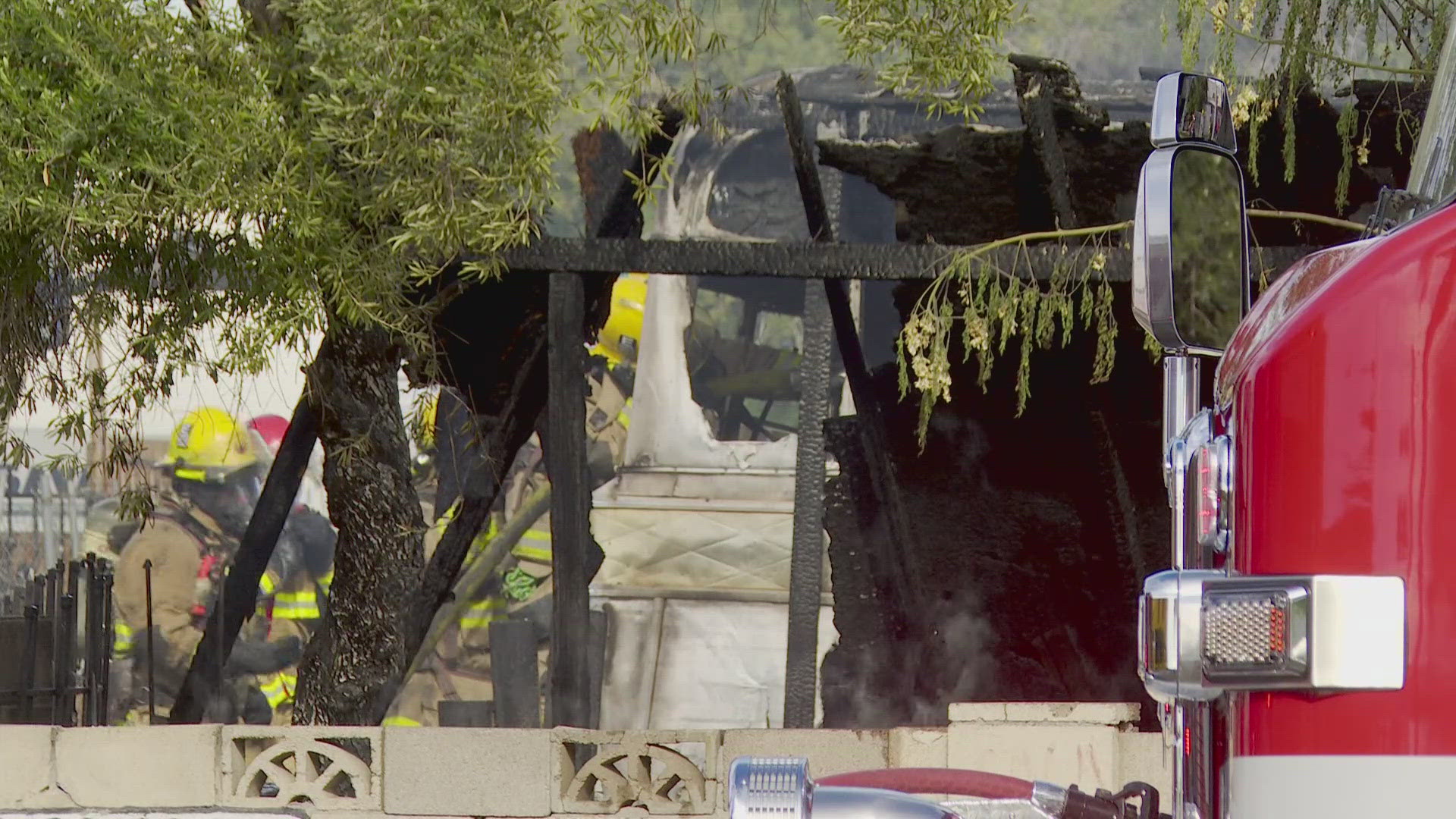 A girl was rescued from a mobile home fire in Phoenix. She was hospitalized with smoke inhalation. The fire displaced a family of three, authorities said.