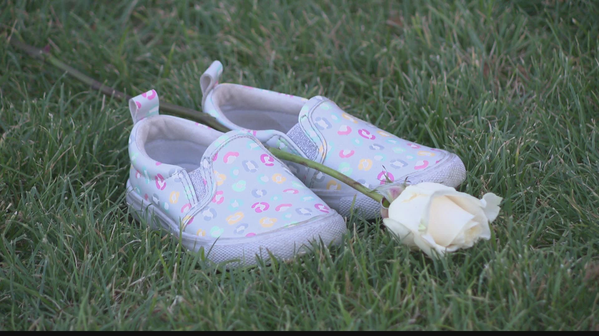 Nineteen pairs of children’s shoes were laid out to represent the 19 children lost in the mass shooting.