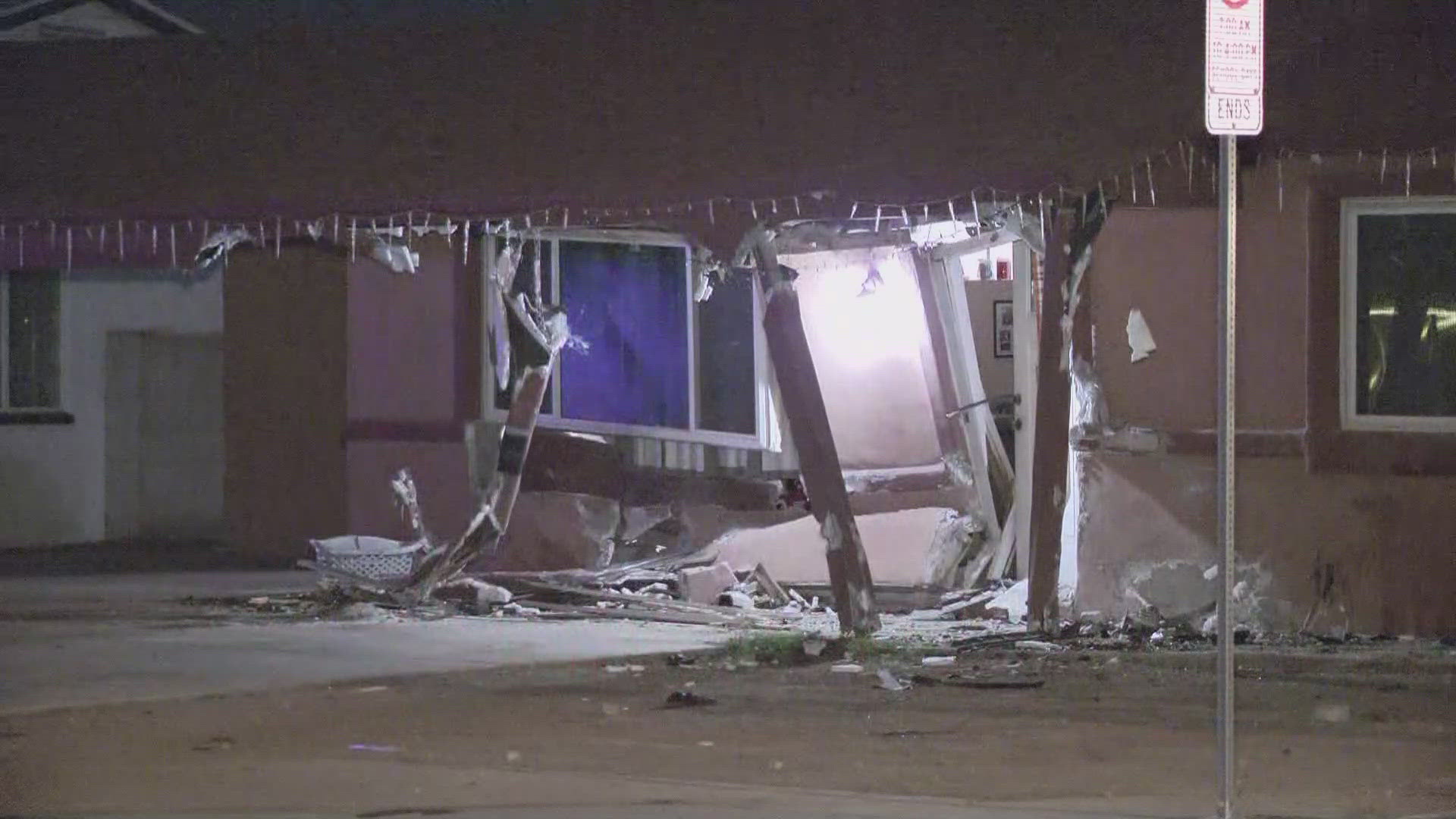 Driver detained after crashing into Phoenix home | 12news.com