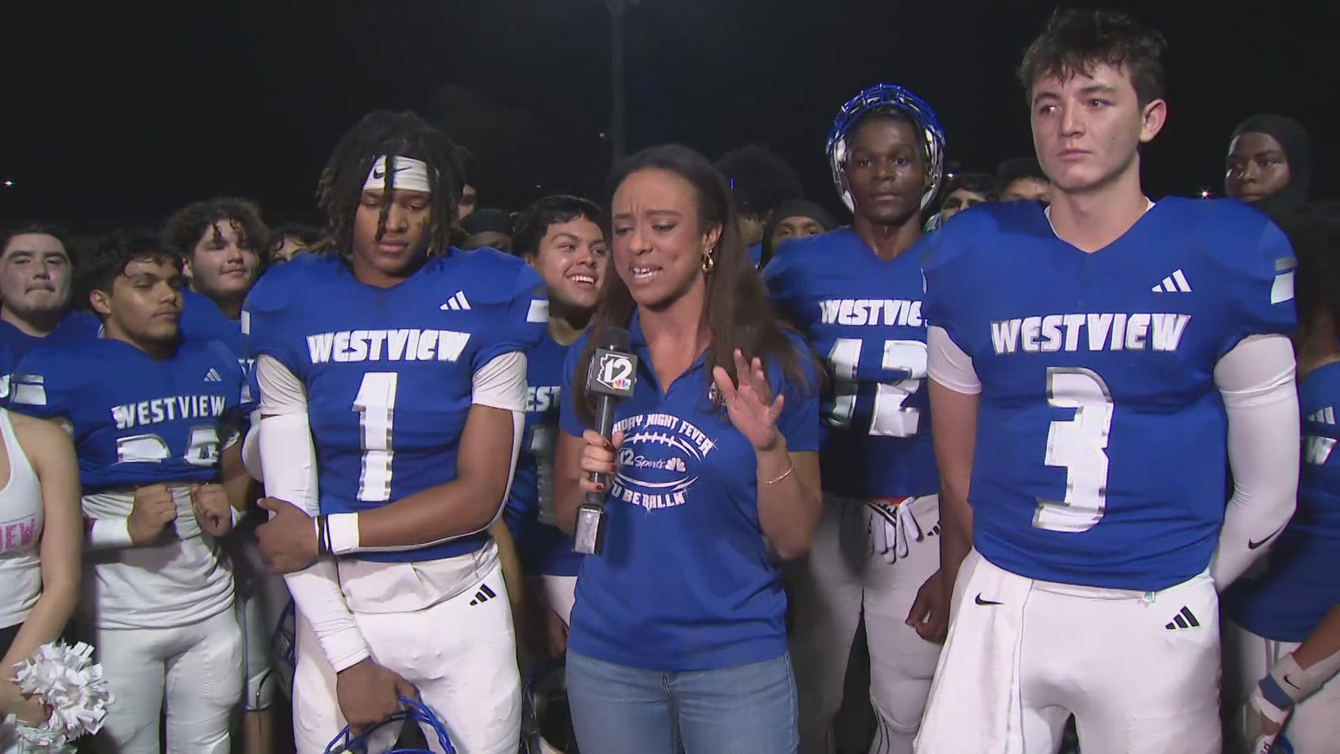 Westview's Addarius Miles and Grant Guidry speak with 12Sports journalist Lina Washington after the the Knights beat Cibola on homecoming. 