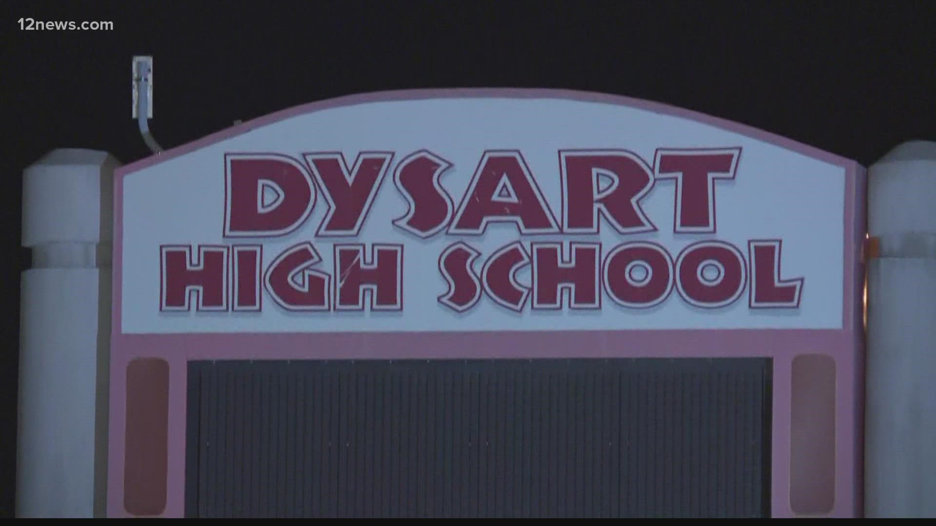 A Dysart High School security guard and assistant football coach was arrested Tuesday on suspicion of engaging in sexual misconduct with a 16-year-old student.