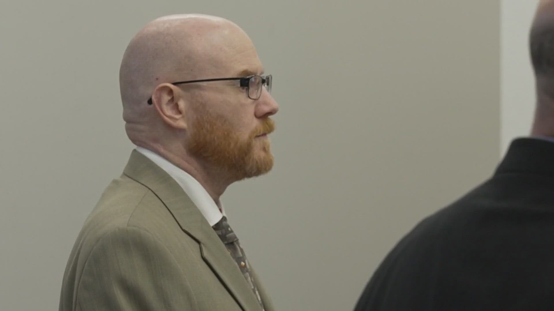 Ian Mitcham is accused of beating a Scottsdale woman to death in her home in 2015. The trial resumes on Monday, Dec. 8.