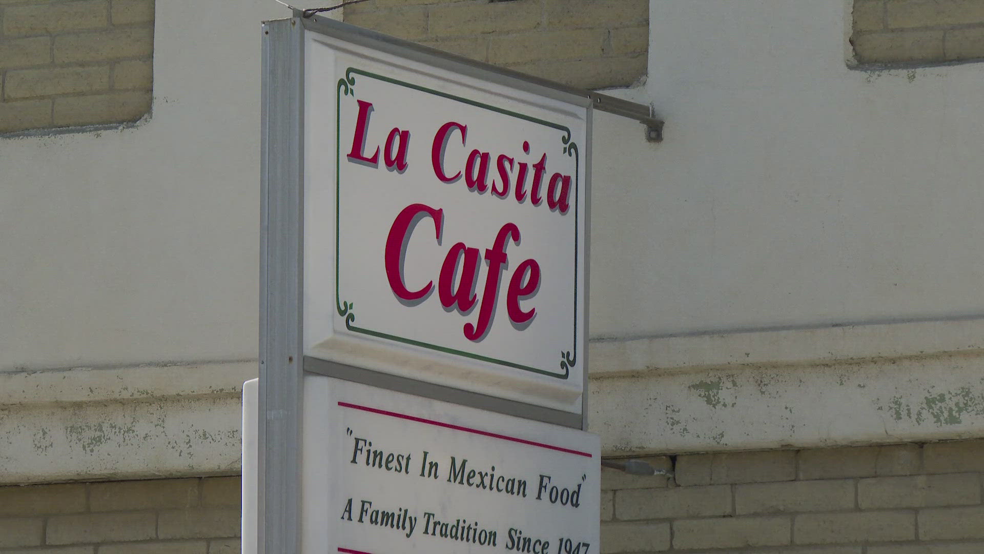 Flood waters left a Globe restaurant filled with mud, but it has reopened after the historic flooding.