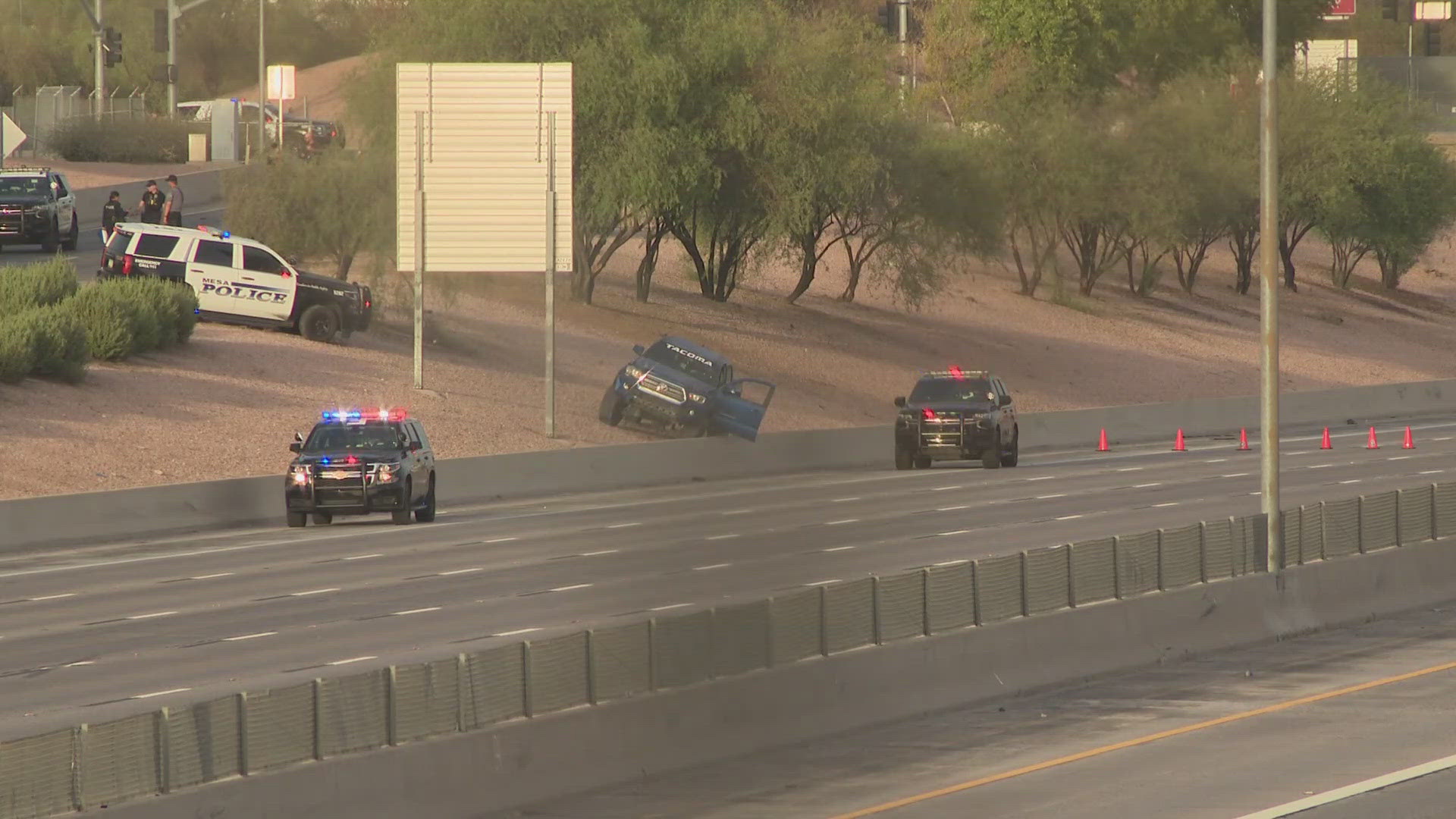 Mesa police say the suspect tried to run across traffic before he was shot by police.