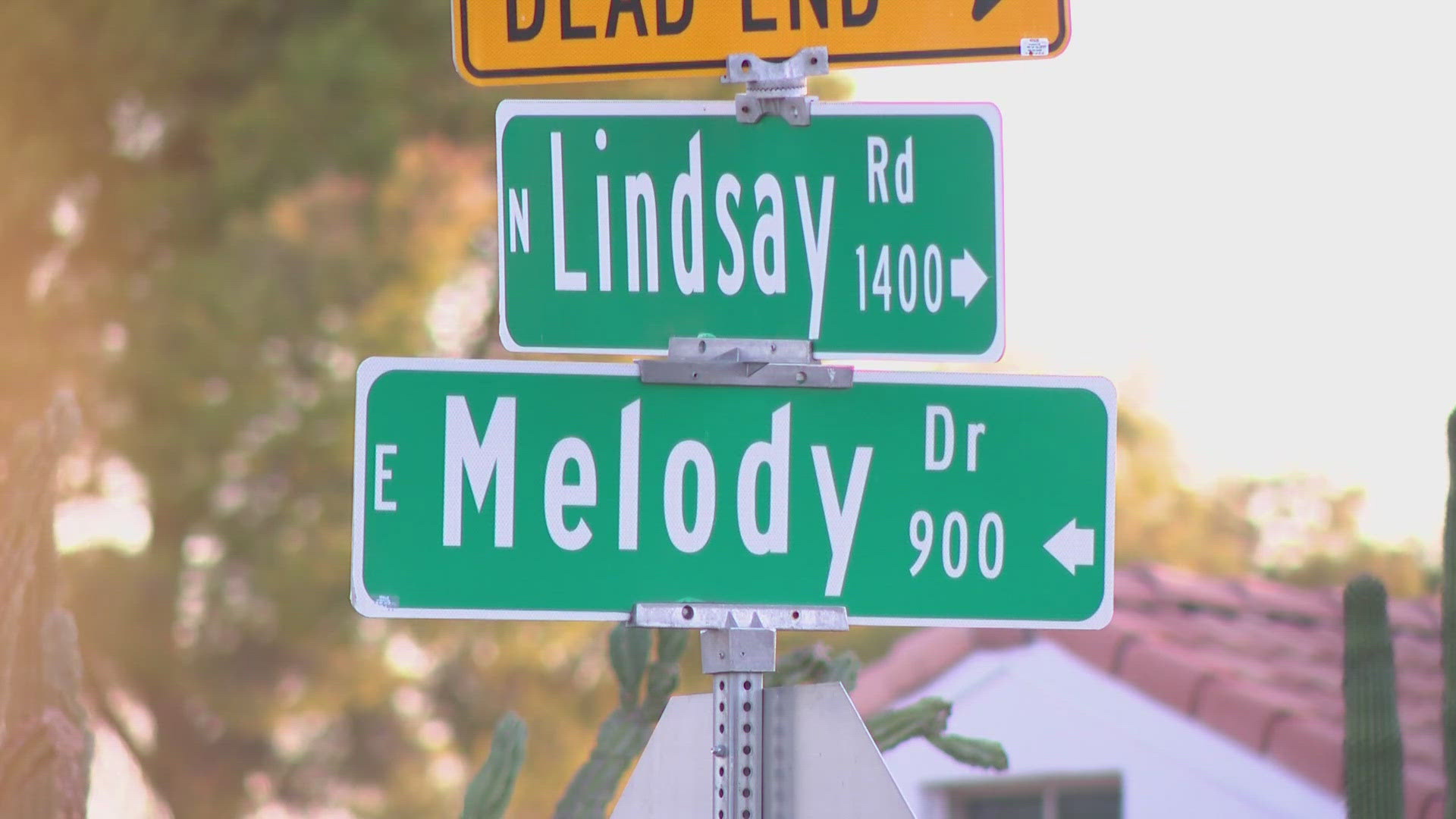 The woman was found dead on Saturday morning in the road near the intersection of Lindsay Road and Melody Drive in Gilbert.