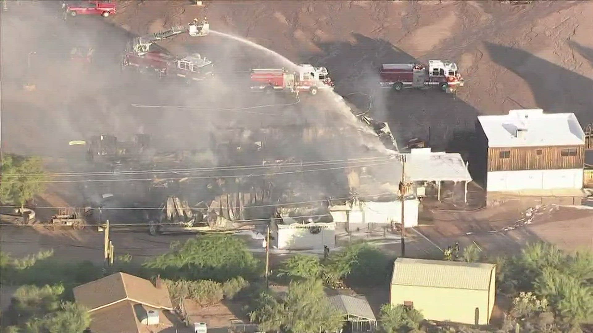 Fire crews battled flames that destroyed the Historic Mining Camp restaurant in Apache Junction.