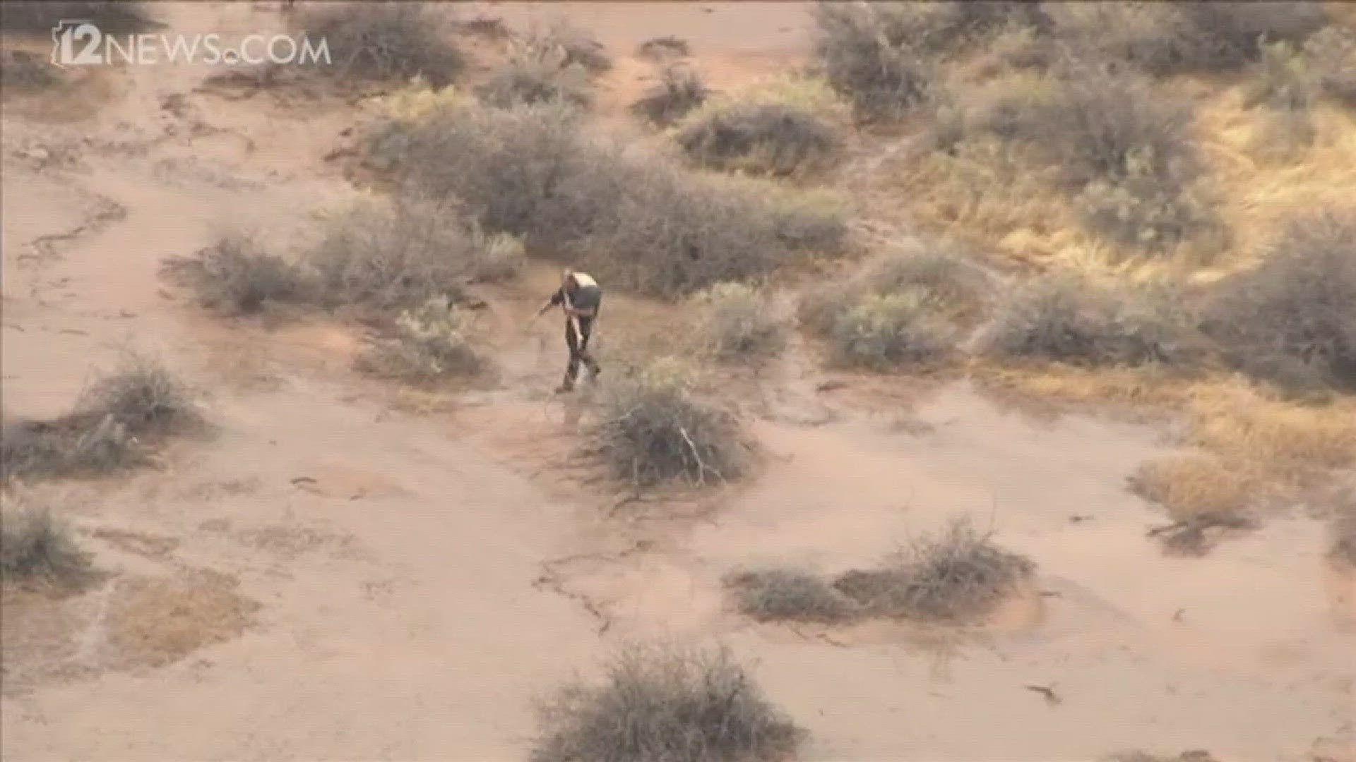 Chopper captured footage of a boy being rescued after being trapped by the monsoon floods in Mesa.
