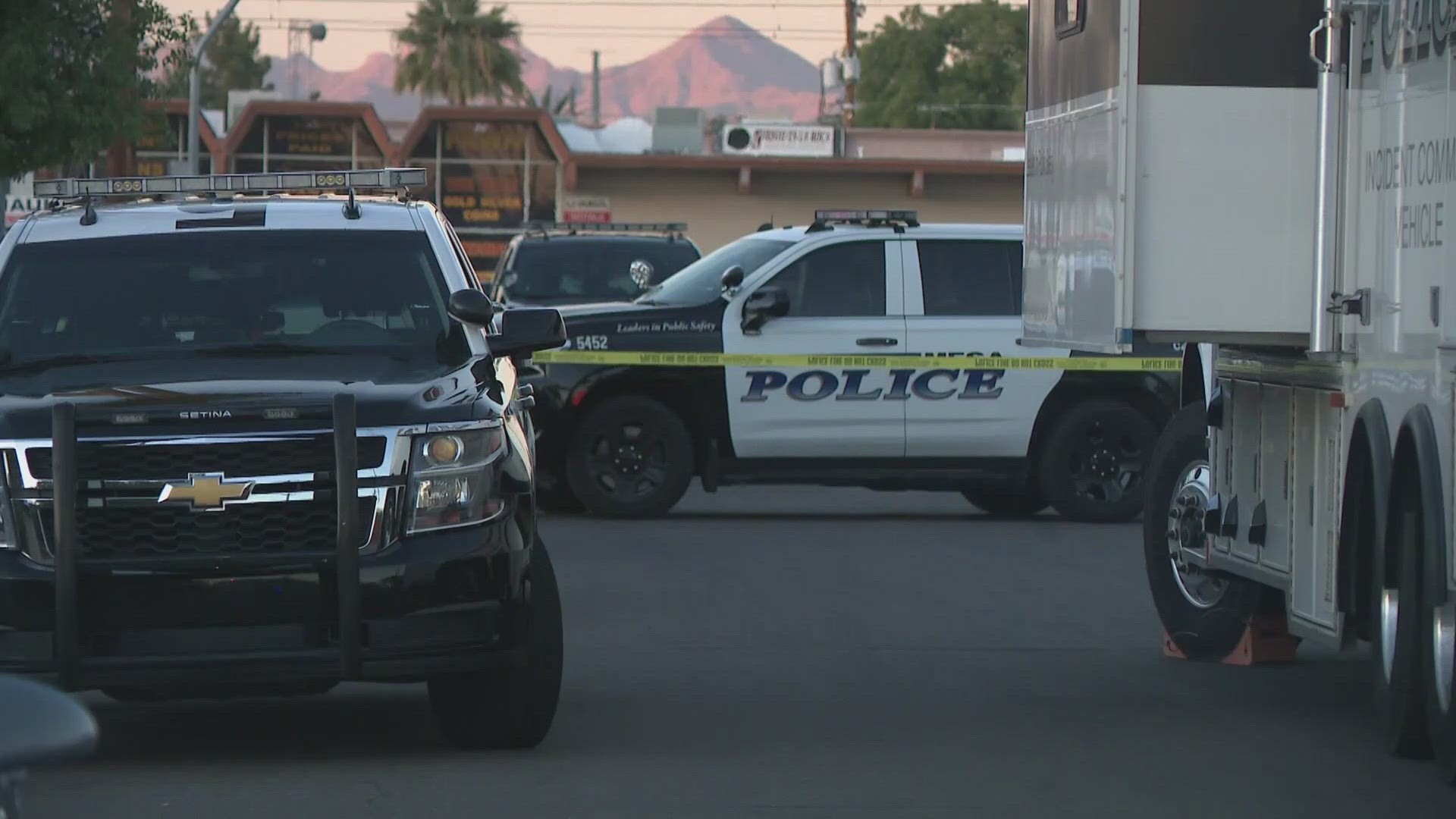 The shooting happened on a smaller street near Main Street and Stapley Drive on Friday morning. The suspect was not struck by lethal gunfire.