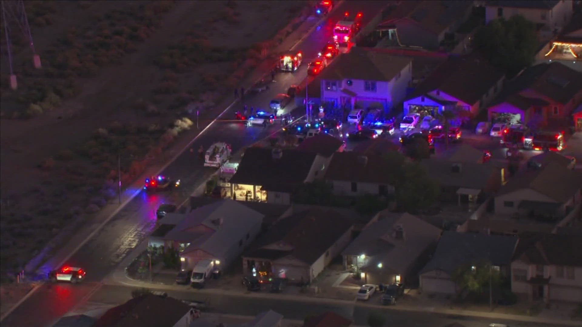 There is a large police presence in an El Mirage neighborhood. 