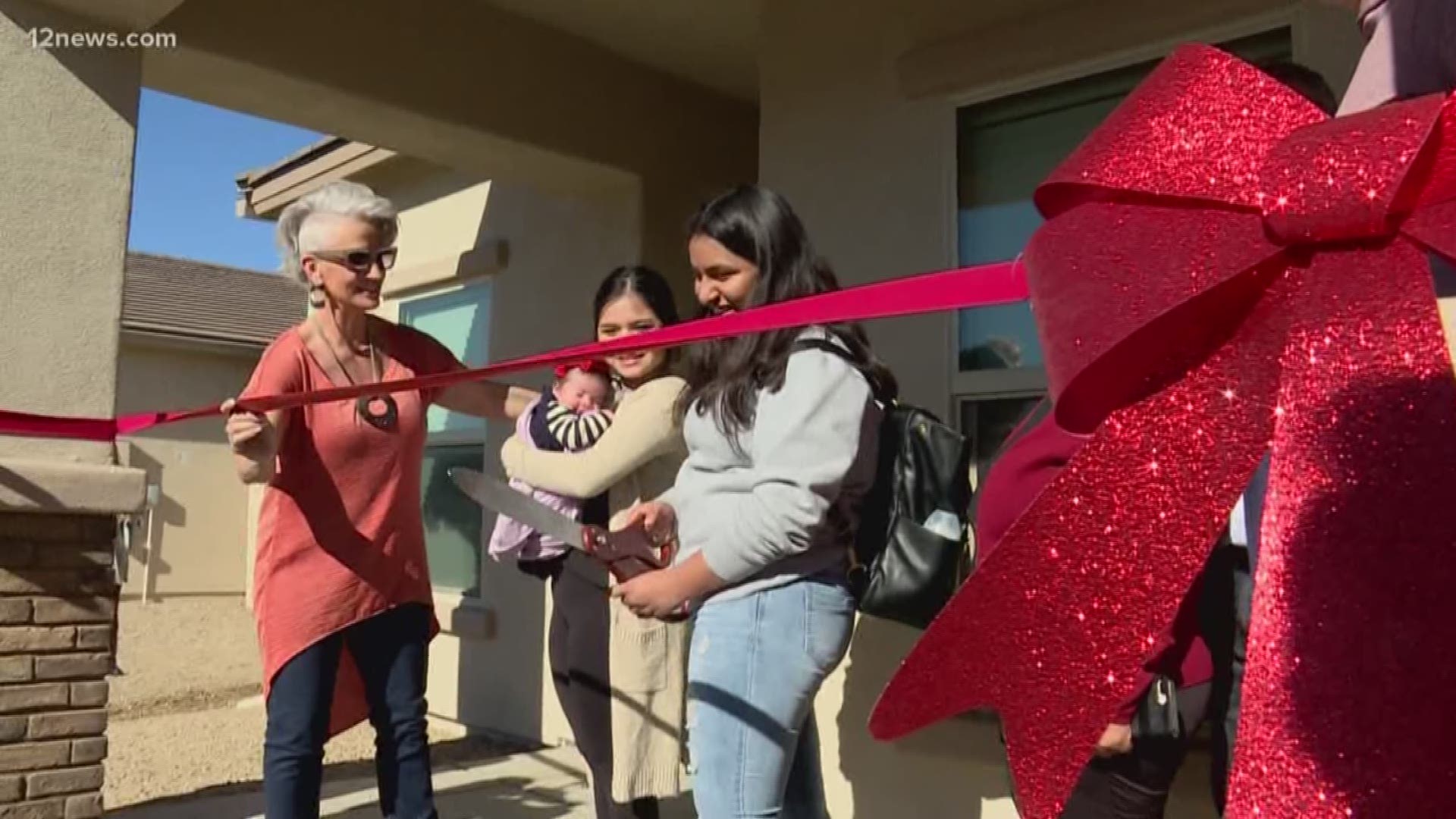 Kurt and Brenda Warner are giving two families in the Valley a home for the holidays. Check out the moment the two families entered their new homes for the first time.