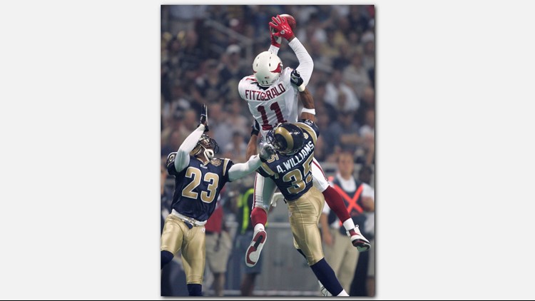 Arizona Cardinals wide receiver Anquan Boldin picks up 11 yards against  Pittsburgh Steelers corner back Ike Taylor in the fourth quarter of Super  Bowl XLIII at Raymond James Stadium in Tampa, Florida