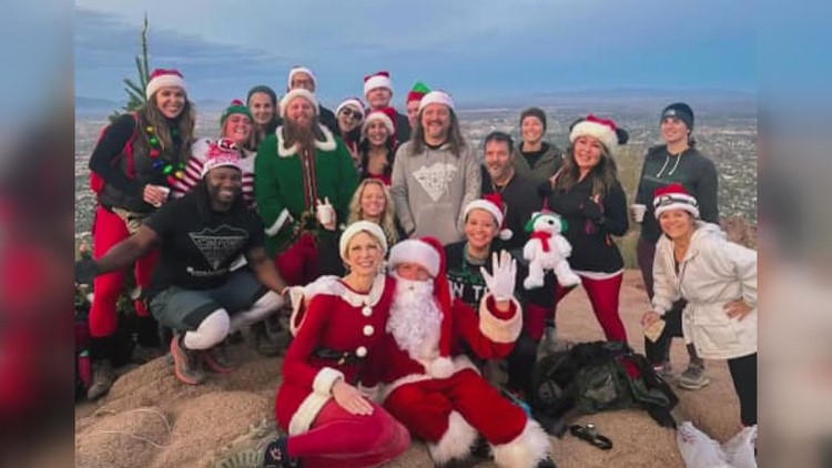 Arizona's 'Camelback Santa' takes yearly Christmas tree up Phoenix mountain