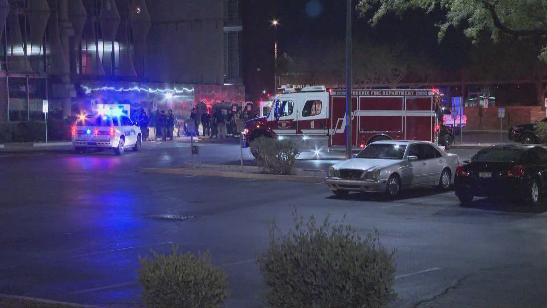 Four people are in the hospital after a fight near of Burton Barr Library in downtown Phoenix escalated into a stabbing, city police said.